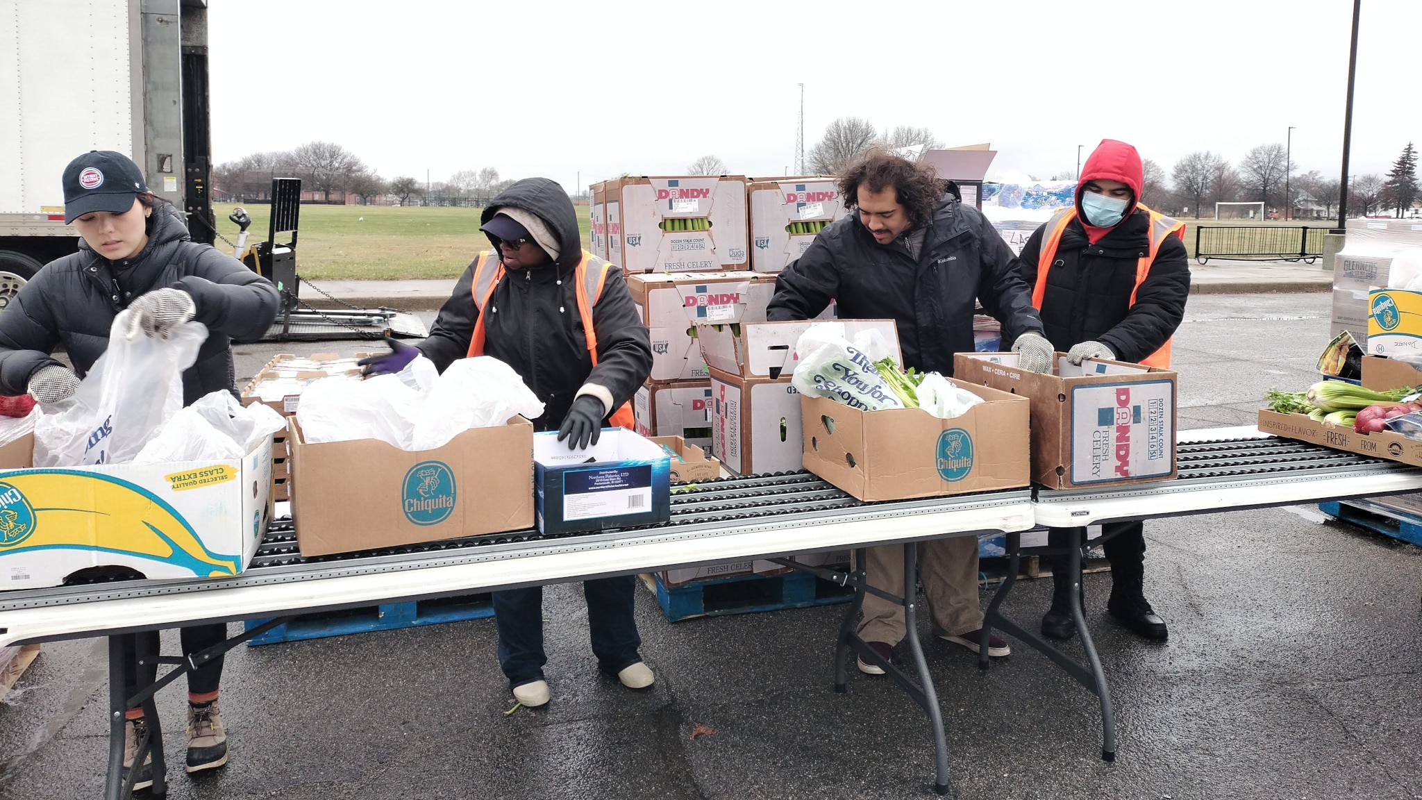 A group of Ford volunteers works at a food bank