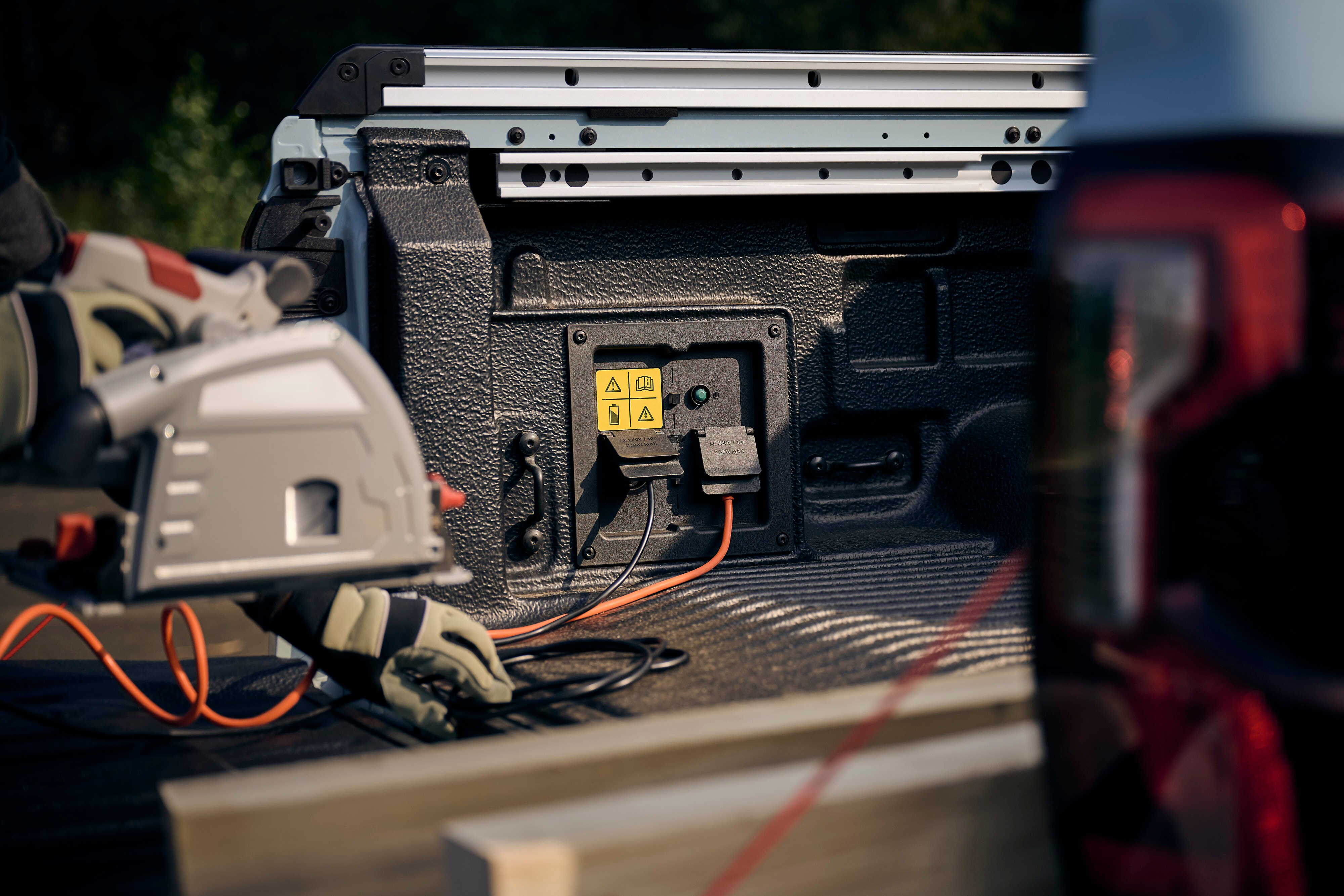 a plug and power tools in a pickup