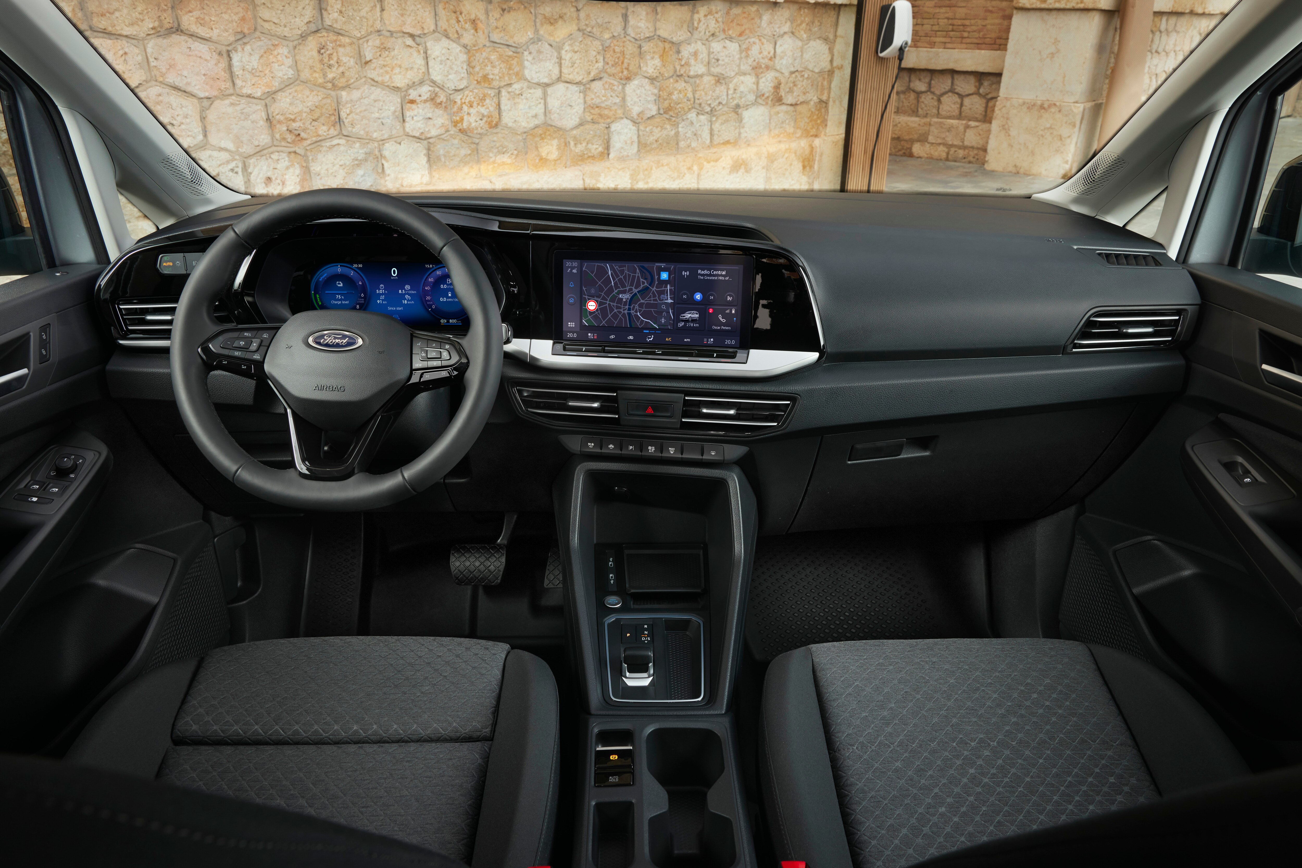 the dashboard of a van, black