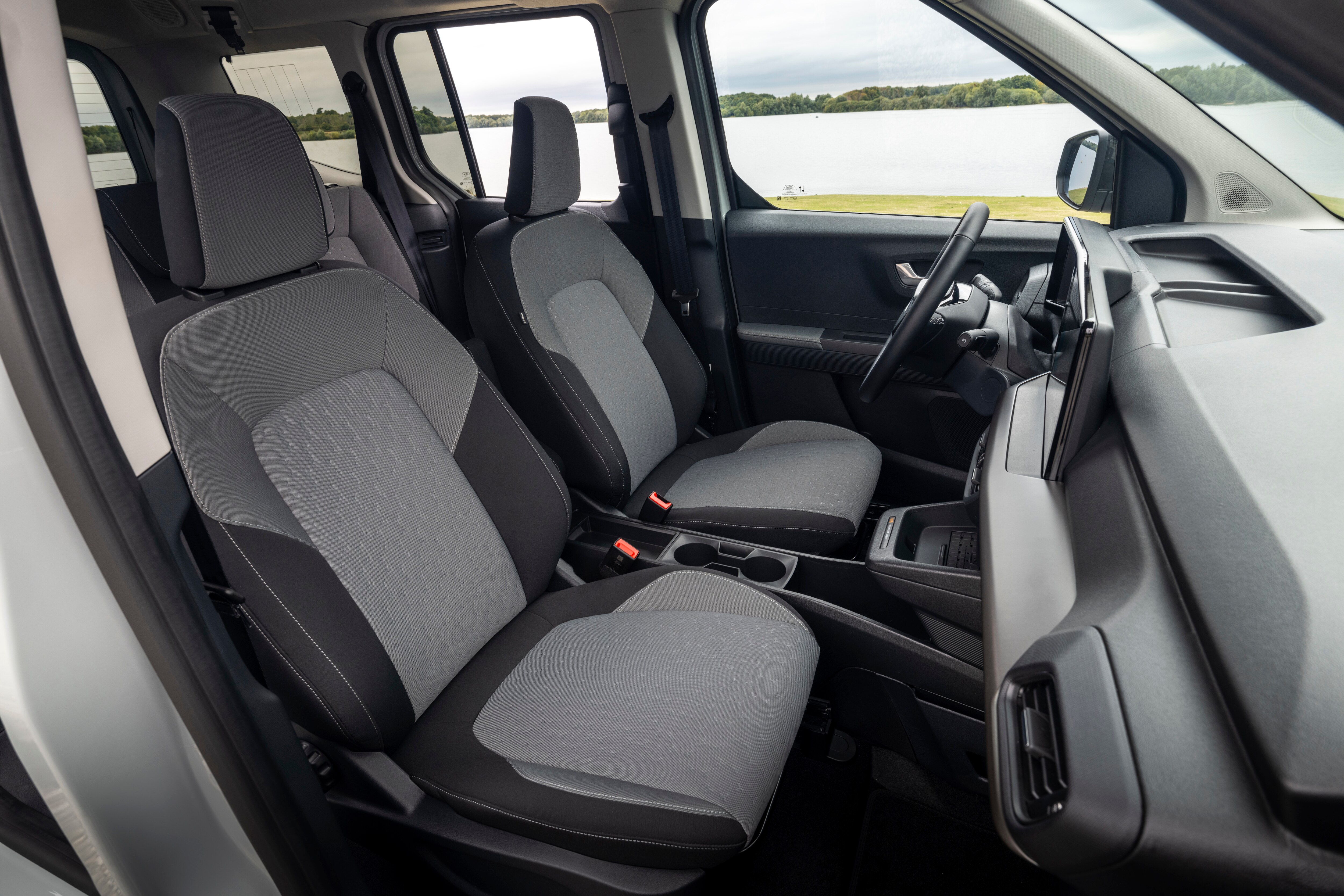 Stylish, Spacious E-Tourneo Courier Expands Electric Vehicle Roll Out. LICENSE EXPIRES: 8th October 2027 - LICENSE BY: Stuart Price LICENSE SCOPE: A - Earned editorial, press releases, press kits. B - All non-broadcast digital and online media. C - All non-broadcast digital and online media, plus Retail and POS (showrooms, events etc). D - All print media (newspaper, magazine etc) REGION: Europe COPYRIGHT AND IMAGE RIGHTS: This content is solely for editorial use and for providing individual users with information. Any storage in databases, or any distribution to third parties within the scope of commercial use, or for commercial use is permitted with written consent from Ford of Europe only.