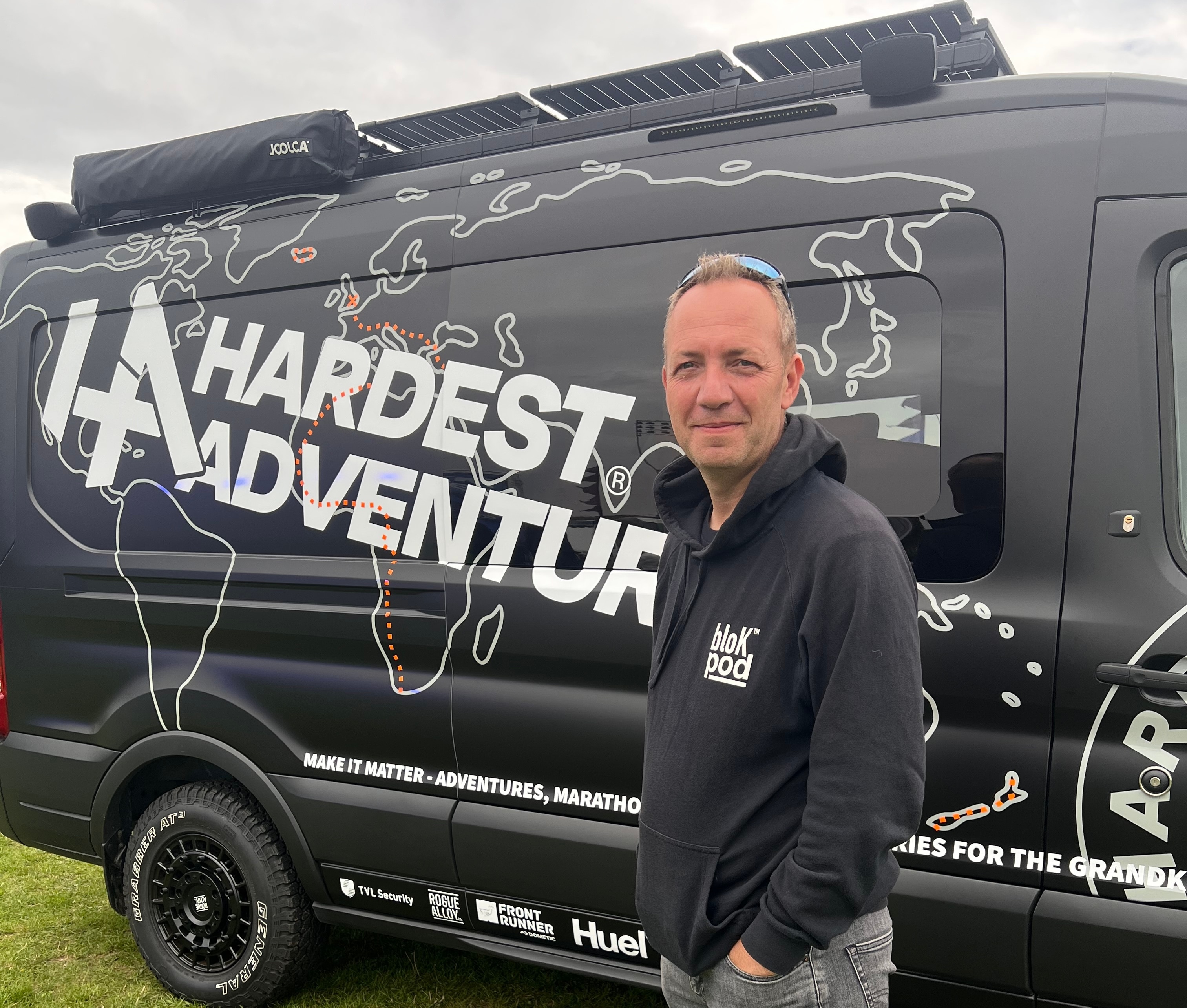 Dan Lindfield, one of the brains behind bloK Pod, with the Ford E-Transit that he and partner Dave Thompson converted for Russ Cook, AKA the Hardest Geezer