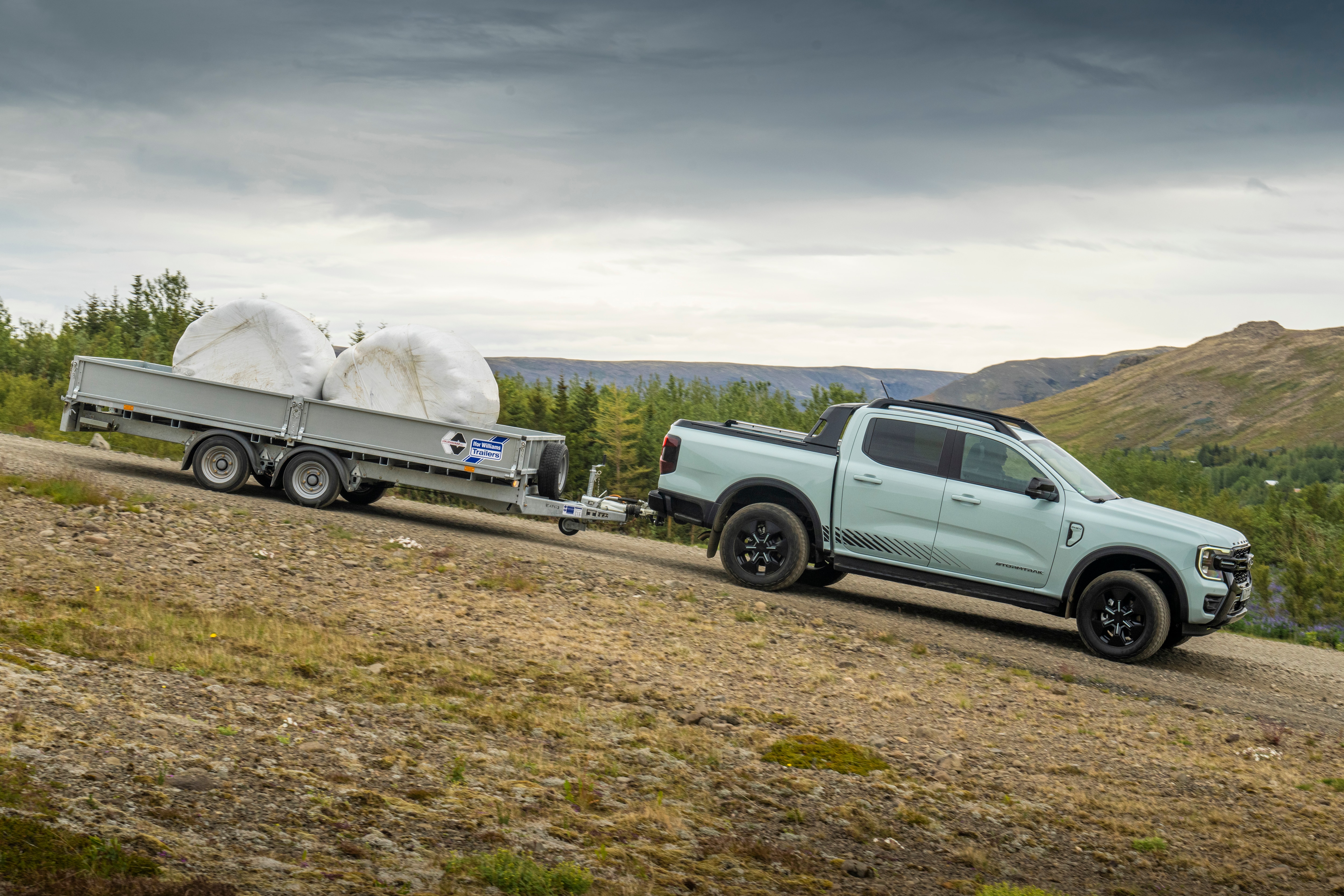 Selectable Drive Modes and all-wheel drive help Ranger PHEV make light work of towing up or downhill.