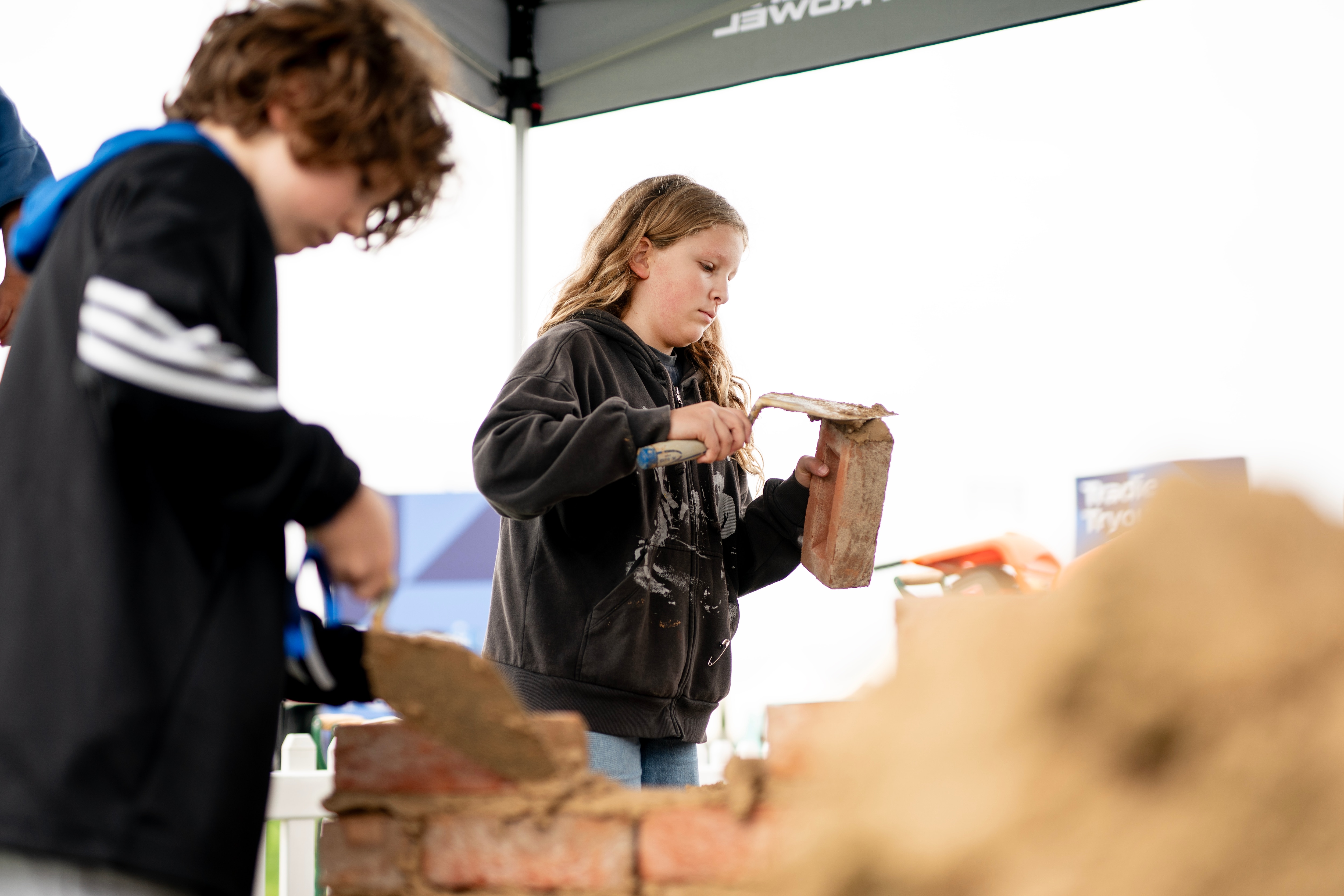The Super Trowel stand drew in plenty of volunteers to give bricklaying a go. License valid for earned editorial, press releases, press kits. All non-broadcast digital and online media Region: Global. This content is solely for editorial use and for providing individual users with information. Any storage in databases, or any distribution to third parties within the scope of commercial use, or for commercial use is permitted with written consent from Ford in Europe GmbH only.