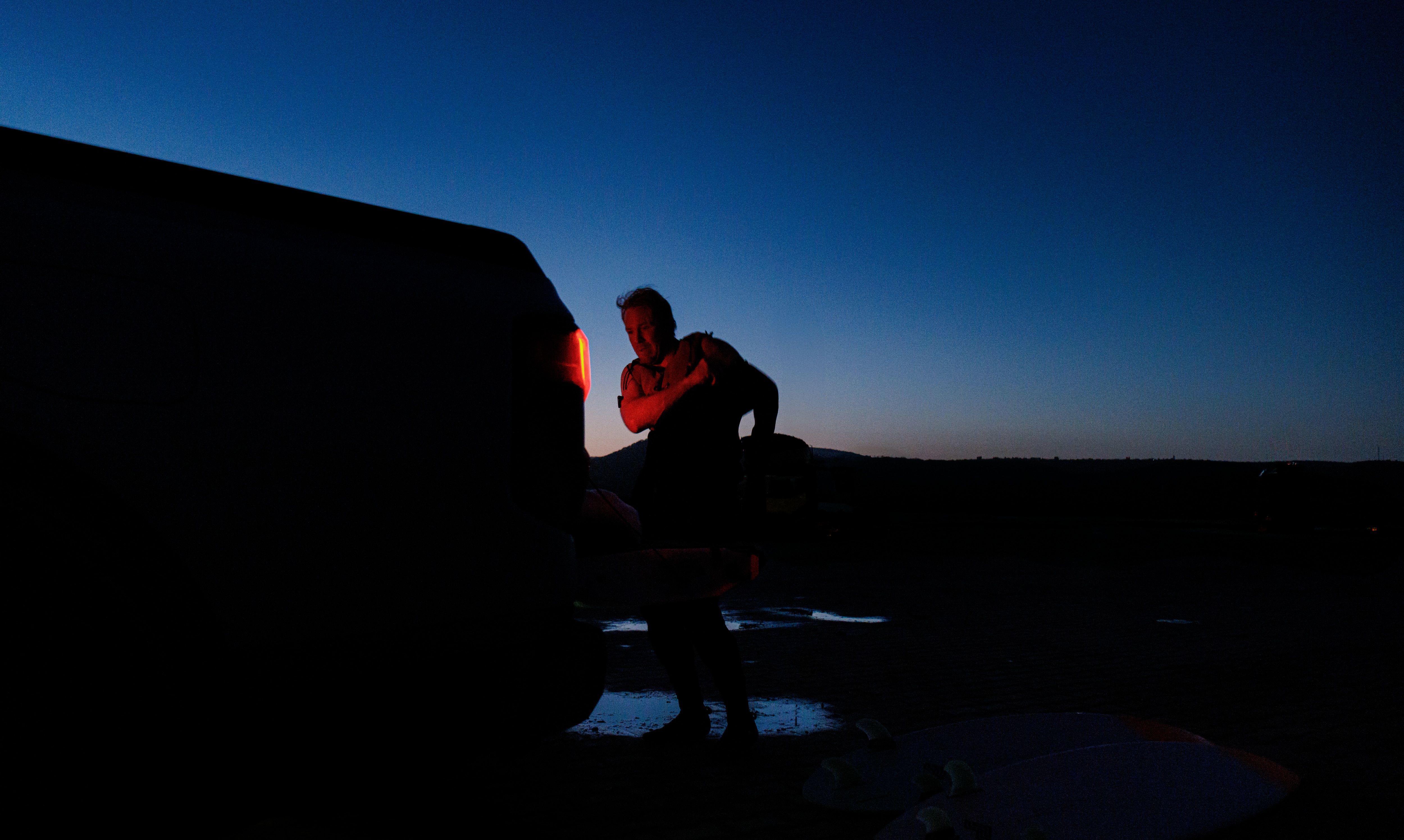 Getting ready first thing in the glow of the Ranger PHEV's taillights. Credit: Sam Sherring