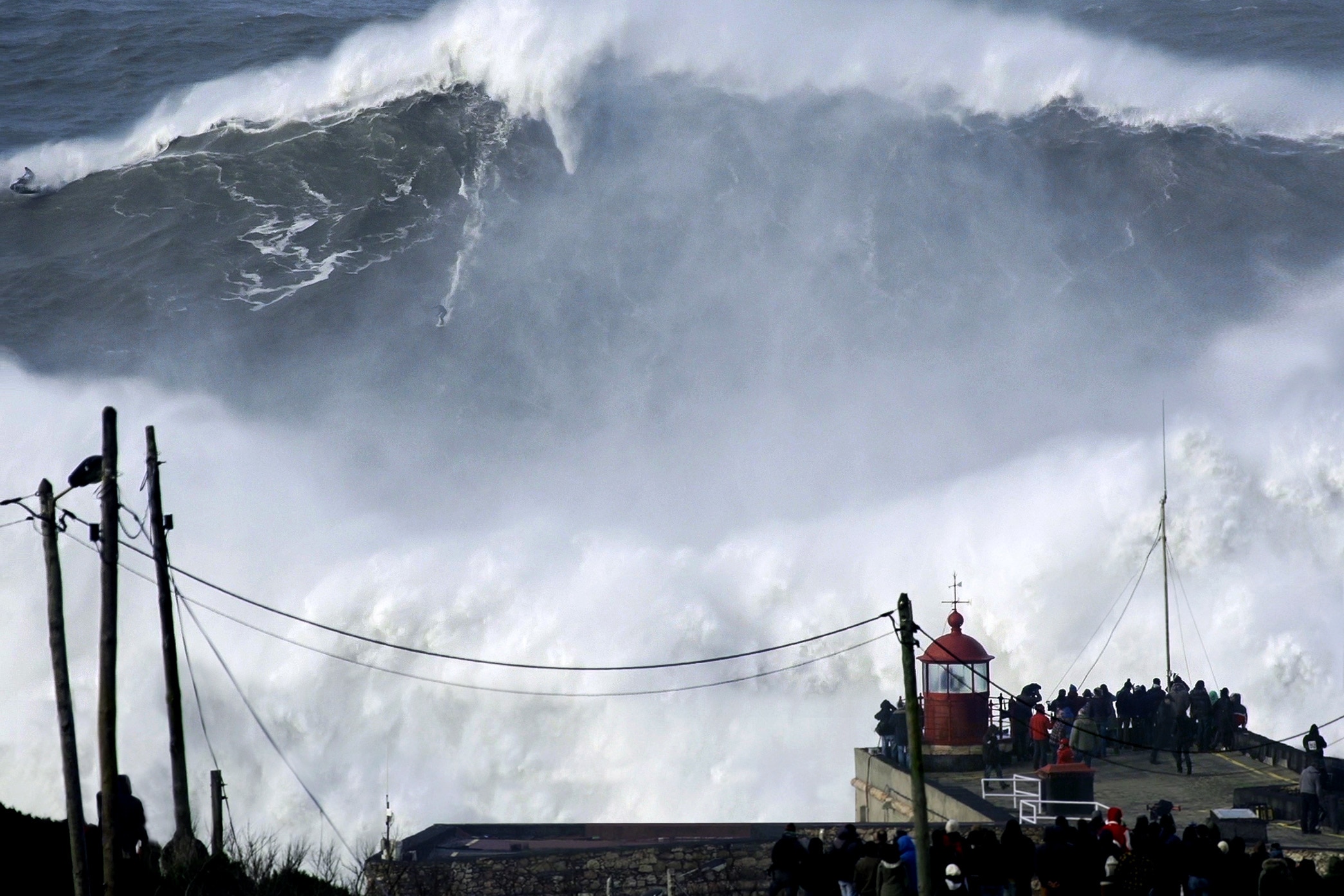 The wave that changed it all; Andrew Cotton on a record wave in 2014 at Nazaré, Portugal. Credit: Jorge Leal