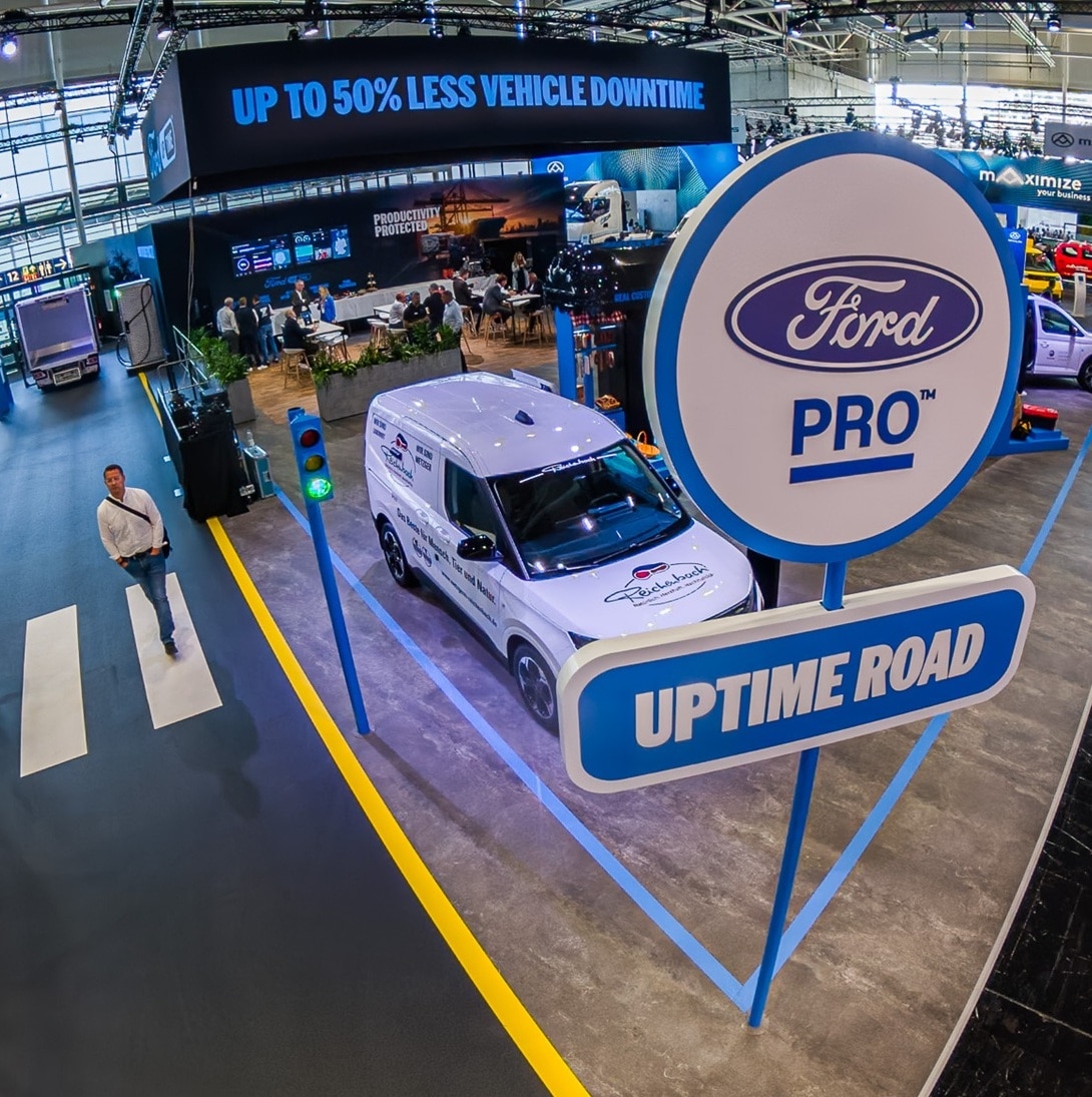 Aerial view of Ford Pro stand at IAA 2026 showing vehicles, uptime screens and large UPTIME ROAD signage