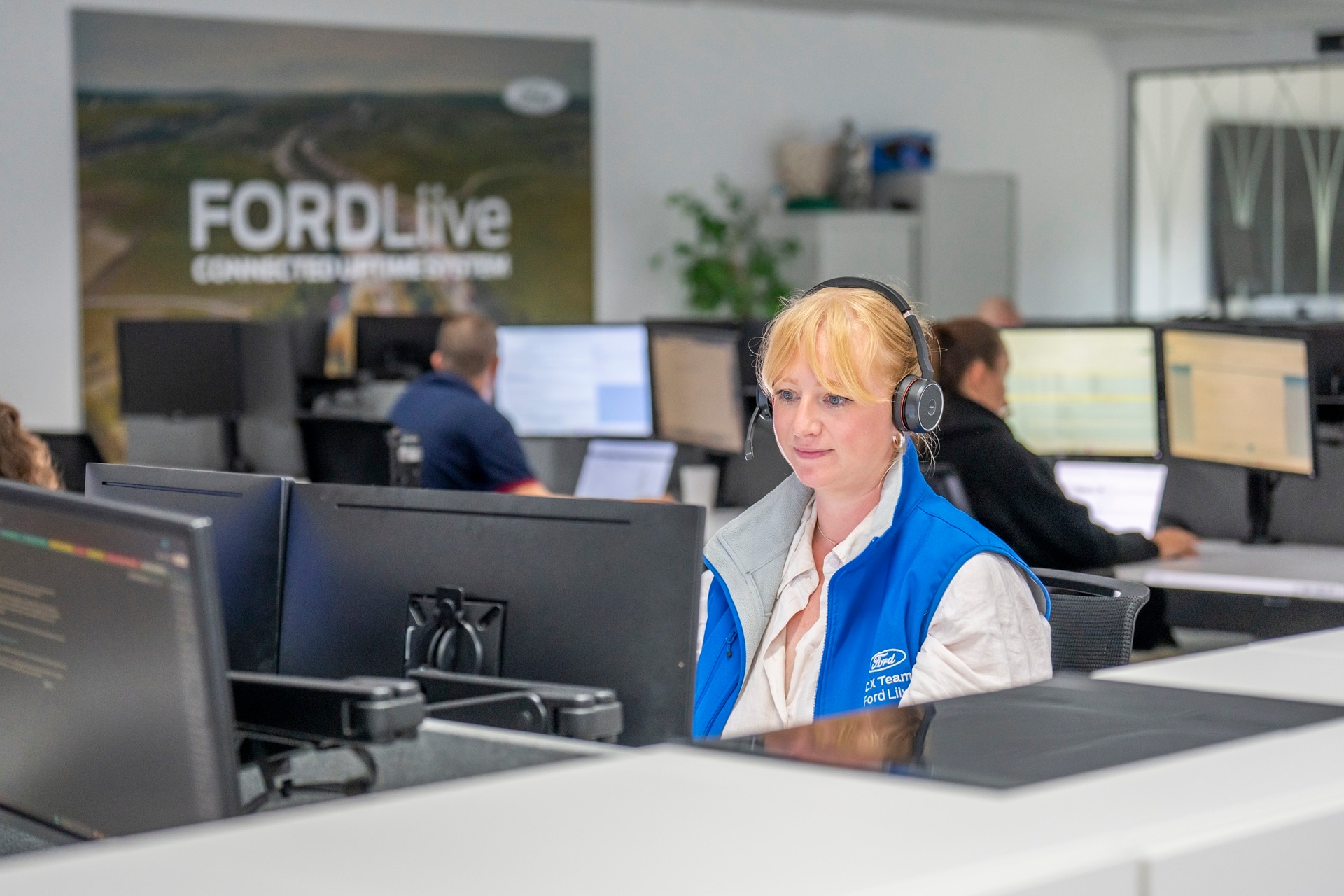 Ford Pro expert monitoring customer data on screen