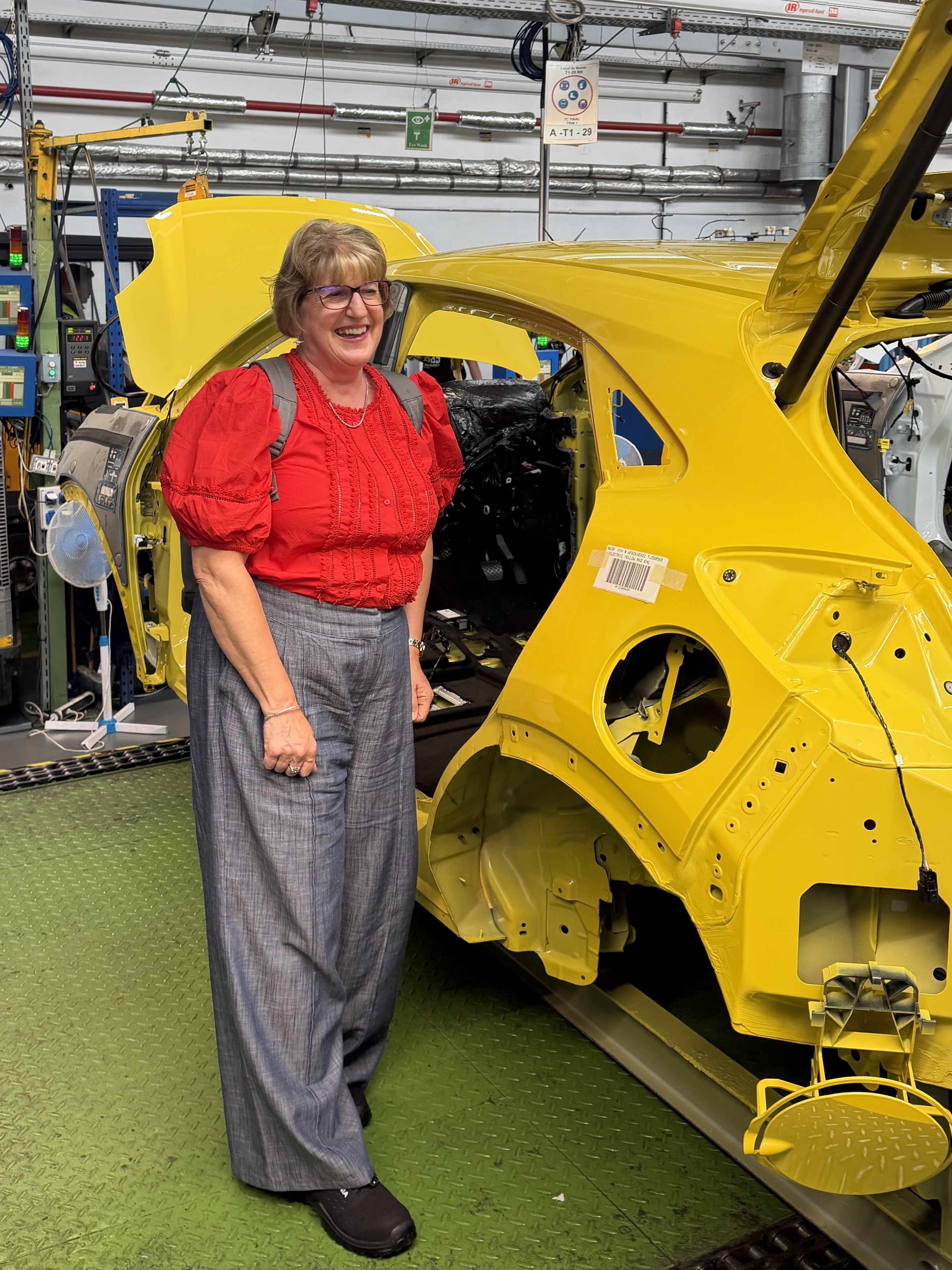 Karen was able to see her new car being built during a visit to the production plant.