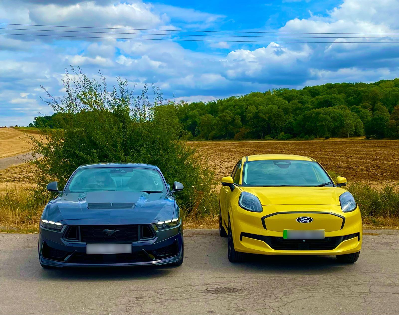 A Ford family: Karen's Puma Gen-E alongside her husband's Mustang Dark Horse.