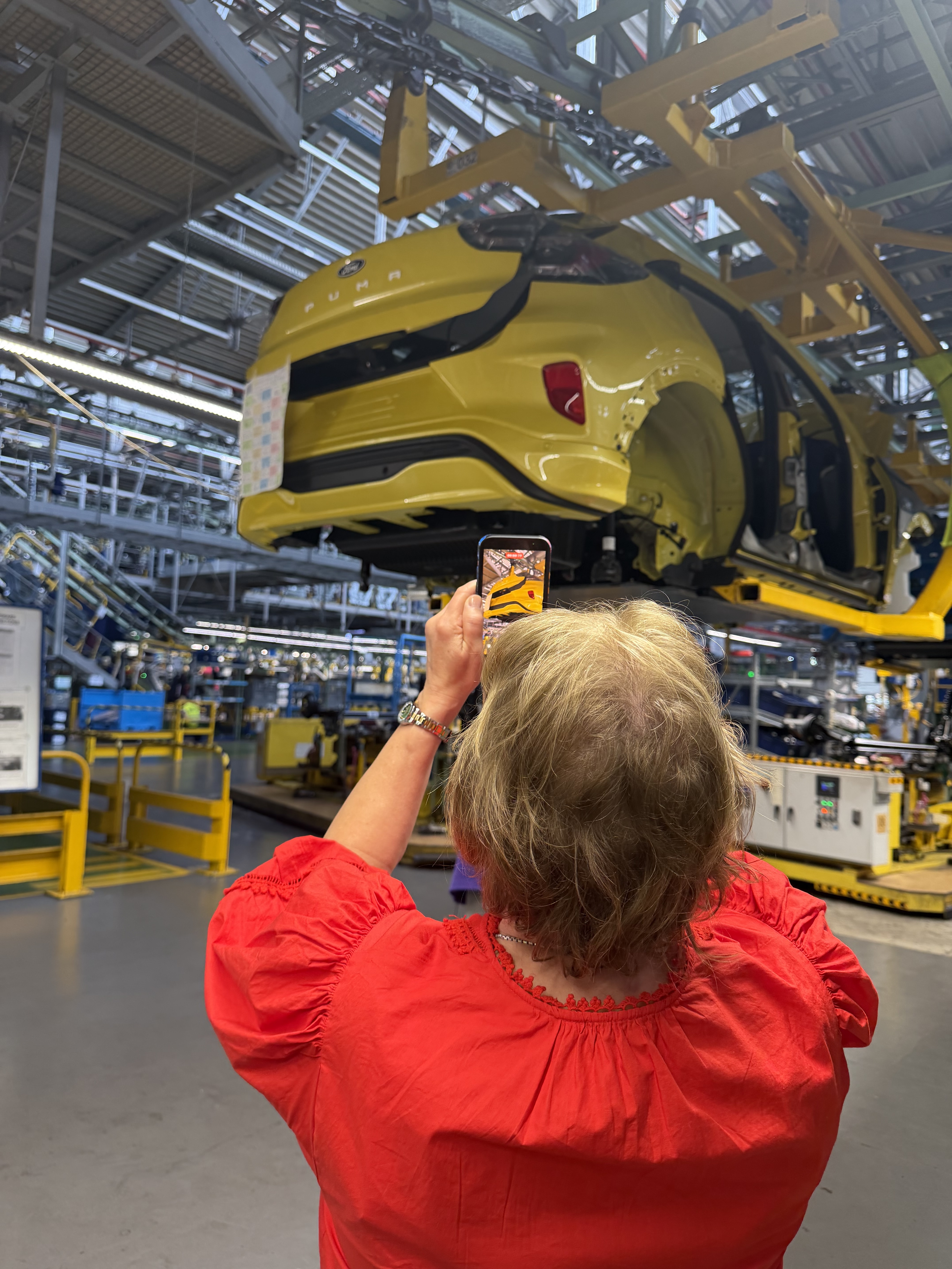 Karen was able to see her new car being built during a visit to the production plant.