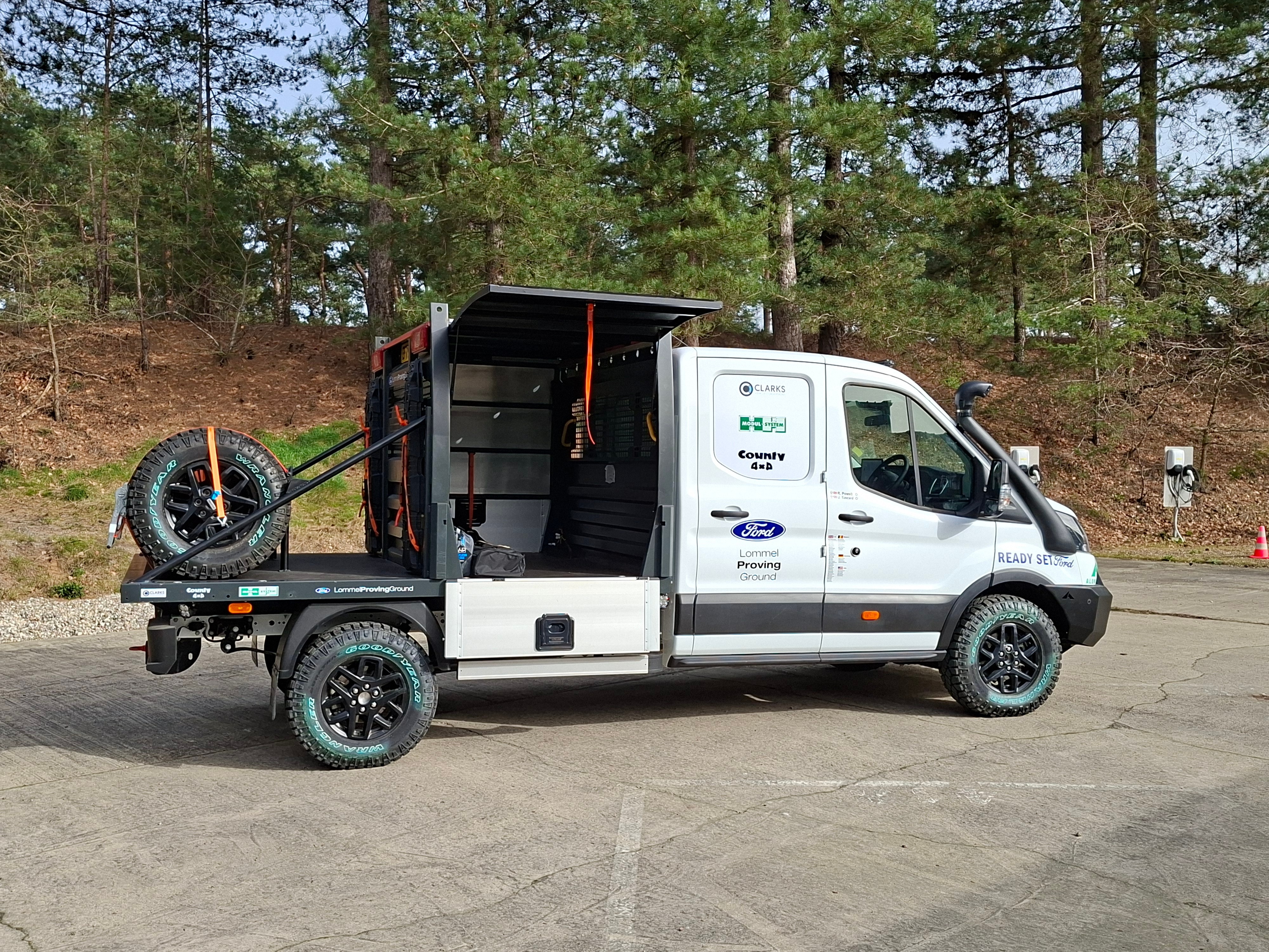 Side view of the Maroc Challenge Transit parked in Ford Lommel Proving Ground
