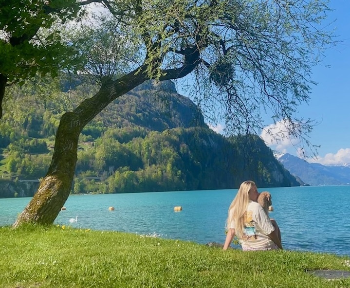 Cuddles with Nova by Oeschinen Lake, Switzerland