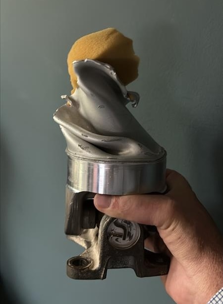A twisted drive shaft demonstrates the extreme torque and mechanical stress endured.