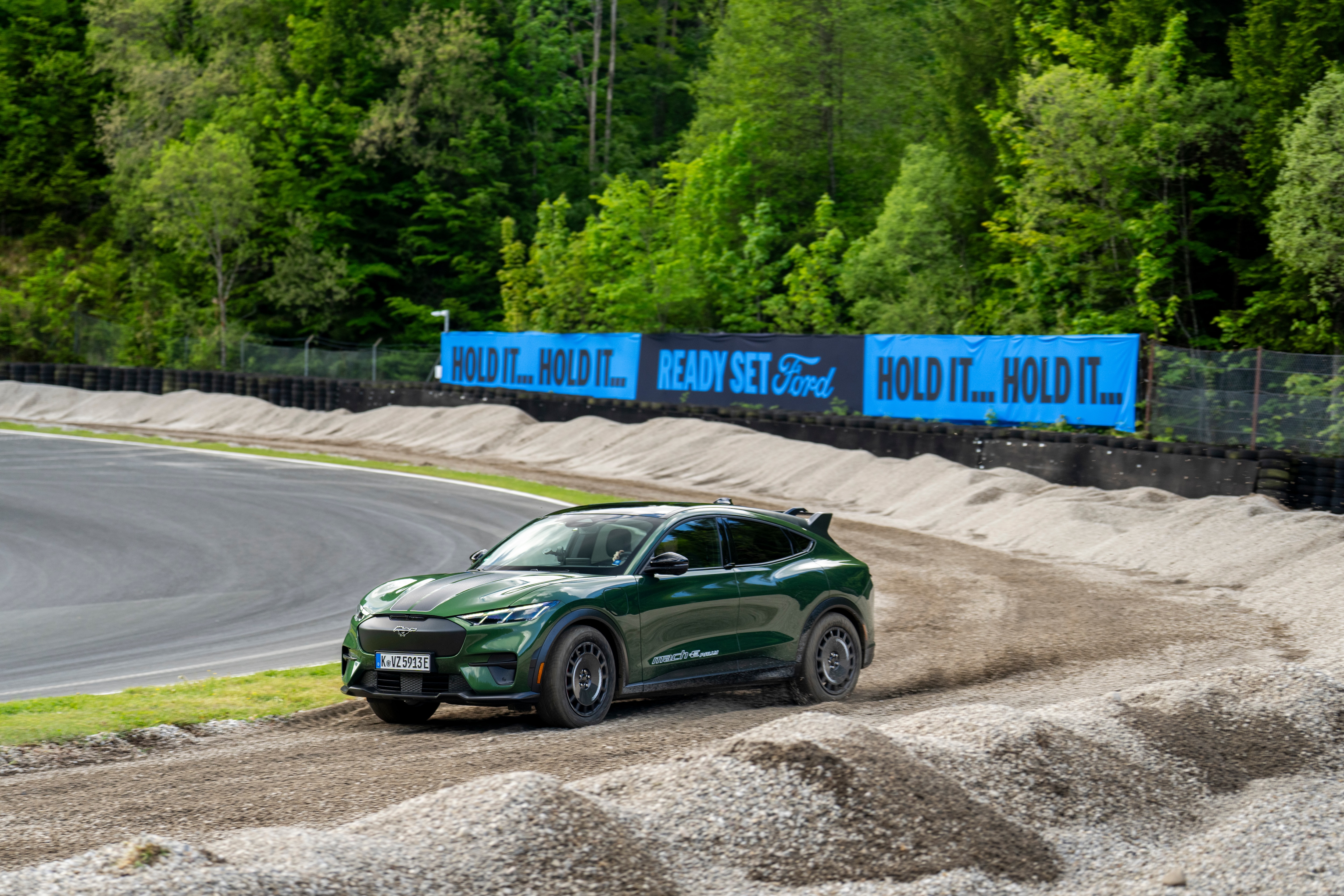 2026 Ford Mustang Mach-E Rally demonstrates its gravel surface capability at the Salzburgring, Austria.
