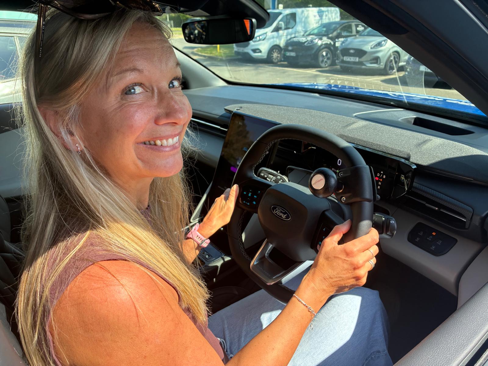 The steering ball adaption has made driving easier for Sophia Warner