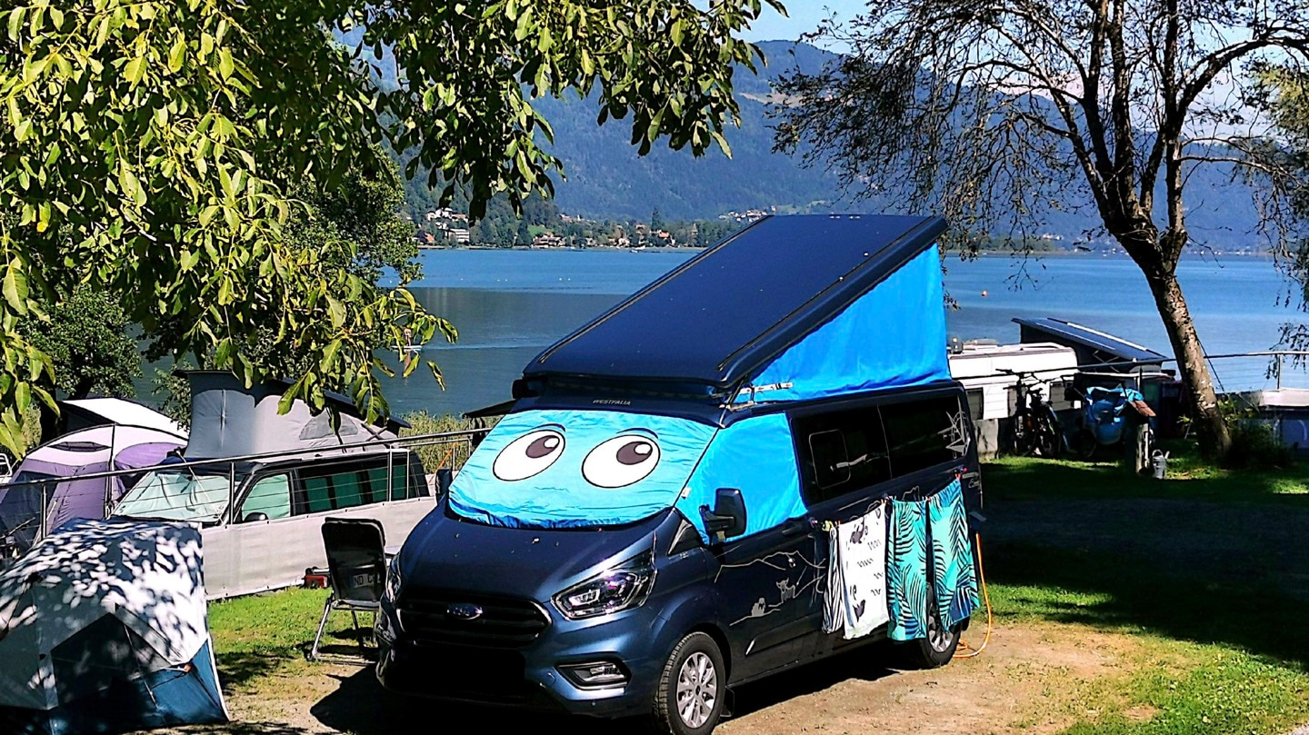 Meet "The Wee Blue Bonnet", Christine and Rainer's trusty vehicle come rain or shine.