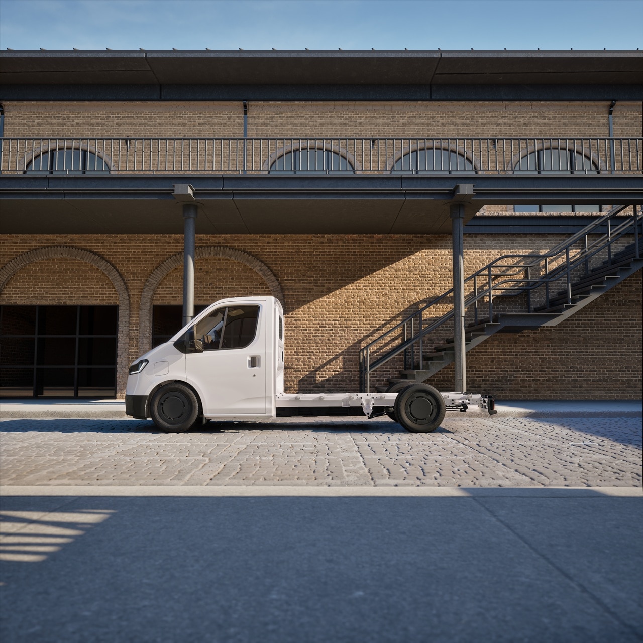 Transit City bare chassis parked in regenerated industrial landscape