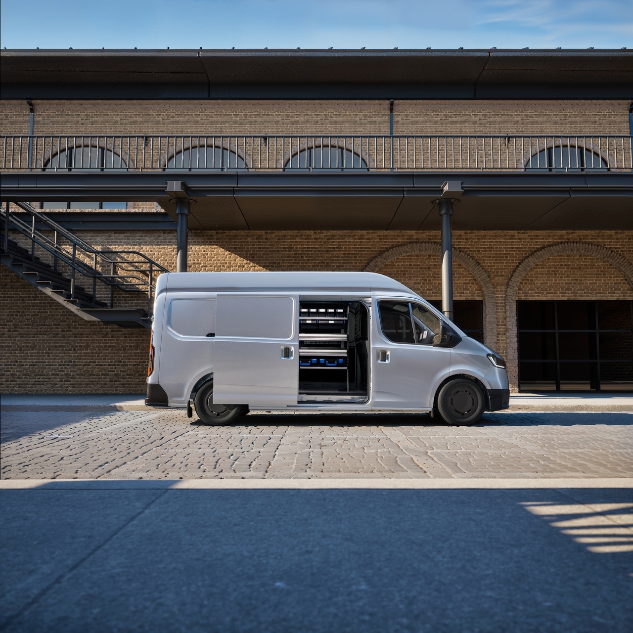 Transit City side view with sliding door open revealing Sortimo SRS racking down the side of the van's cargo space.