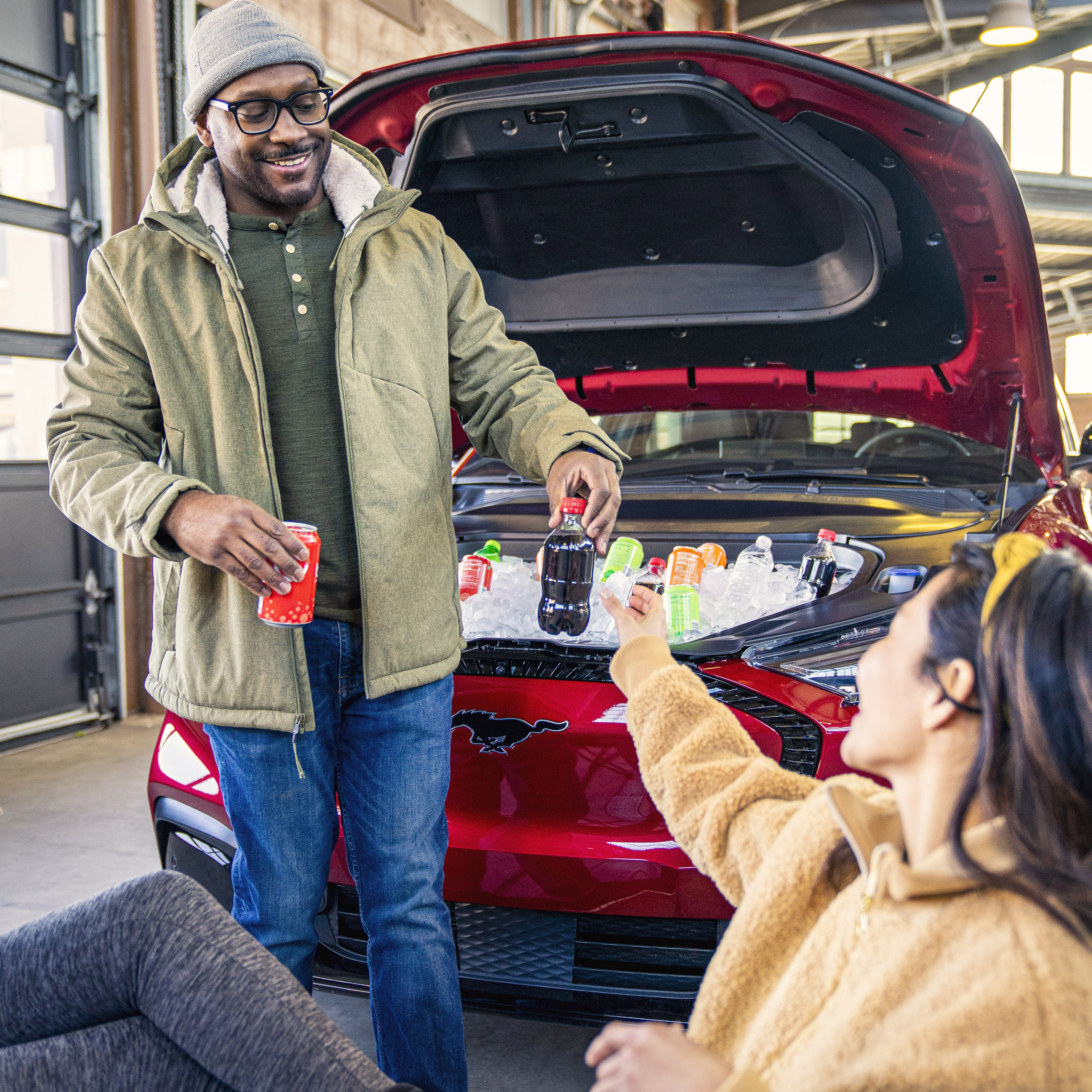 Football fans can elevate their tailgates for next season with the all-electric Mustang Mach-E’s front trunk, or frunk, a 4.8-cubic-foot plastic space – the equivalent to a 36-gallon cooler – that sits underneath the hood.