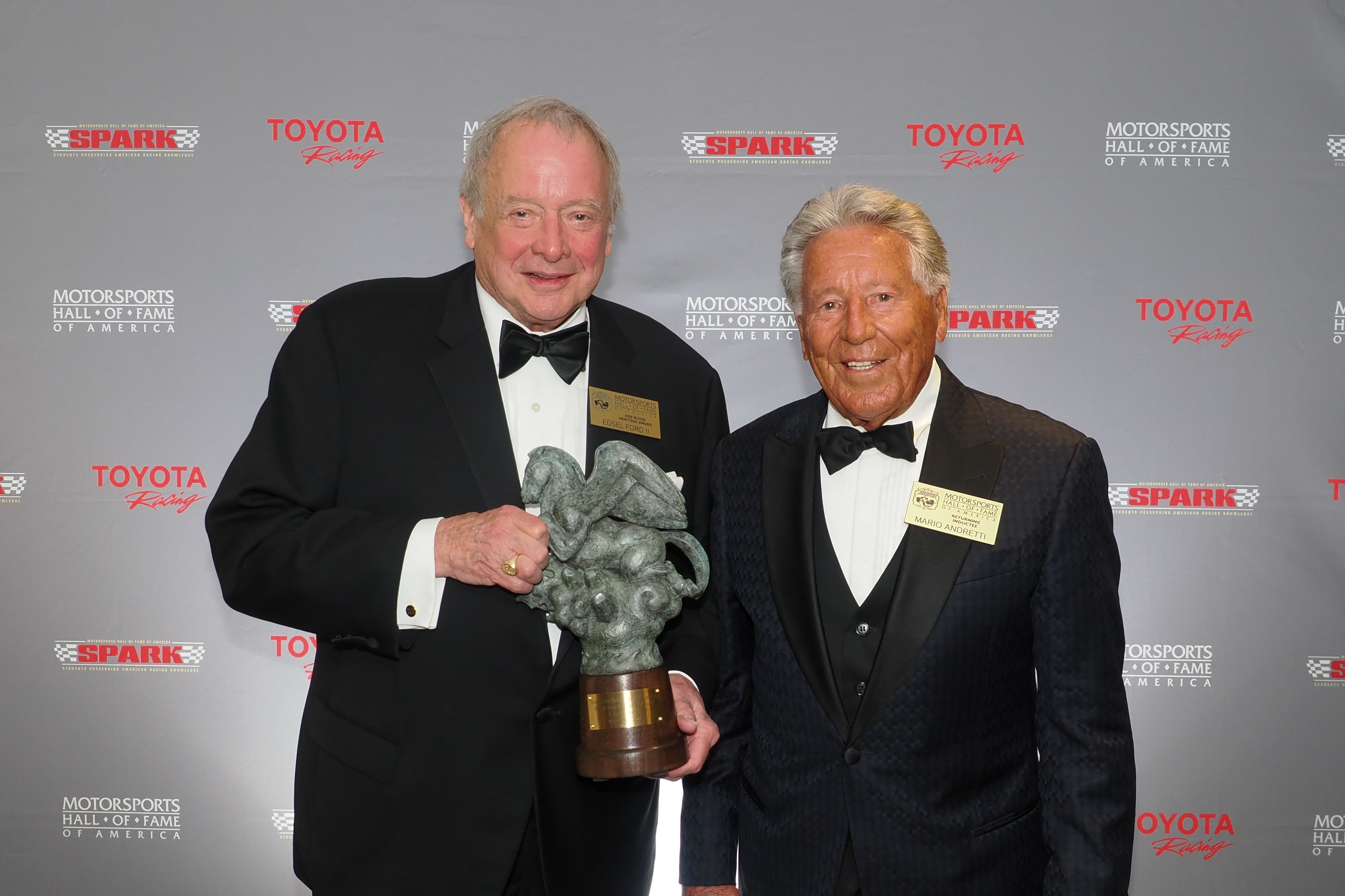 Edsel Ford II and Mario Andretti with the "Hero of Horsepower" trophy in 2024. 