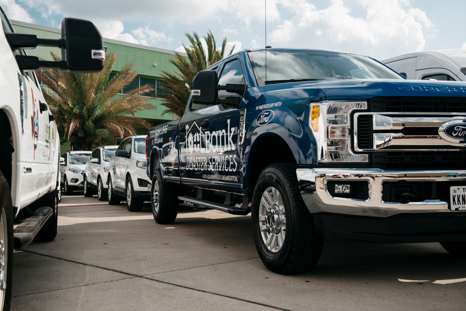 Ford employees, Houston-area Ford dealers and local nonprofits gathered at Houston Food Bank for a Texas Is Family community event that marked the donation of 38 Ford vehicles to eight organizations in the state.