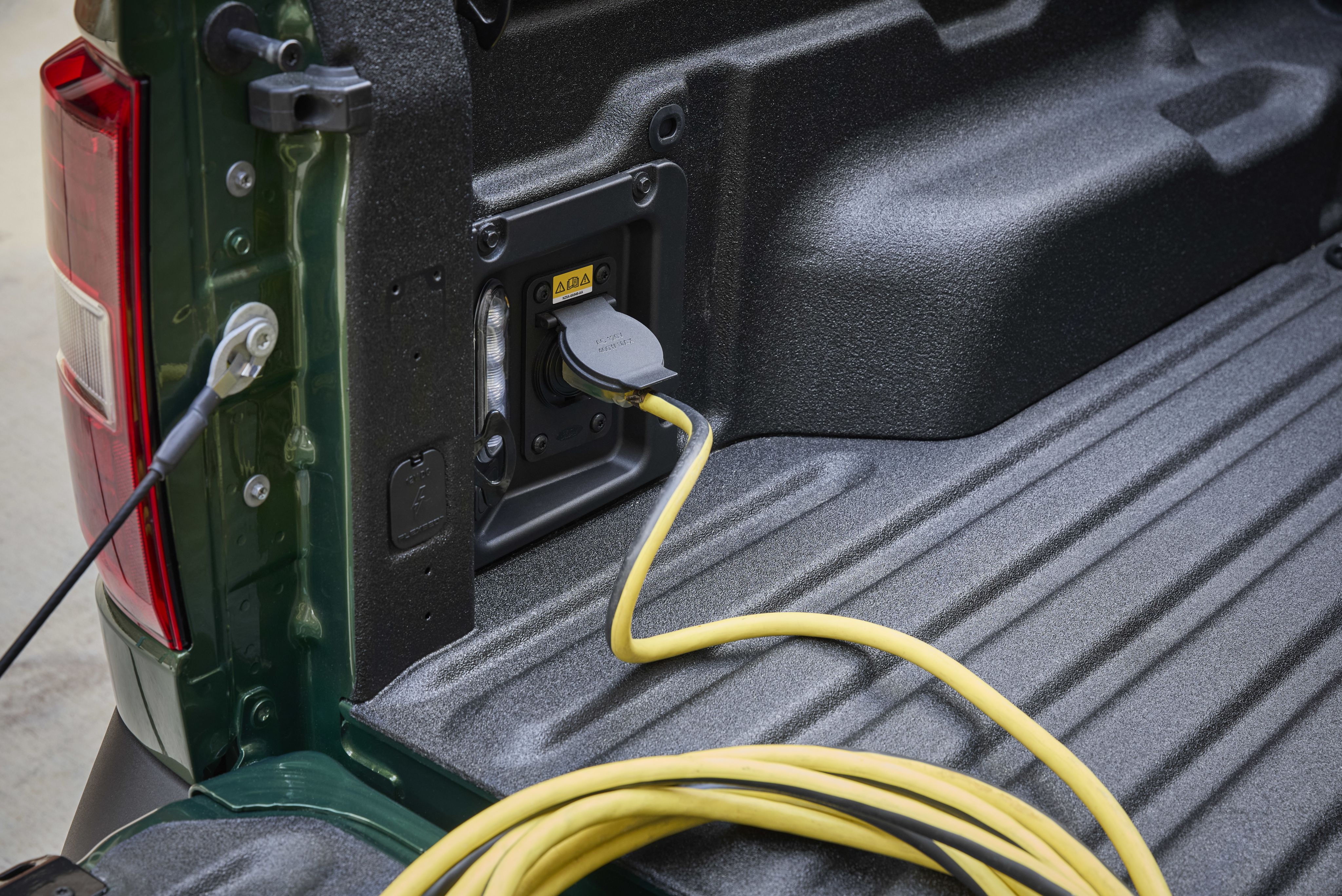 Accessing power to plug in gear is easy with the 110V/400W outlet in the bed.