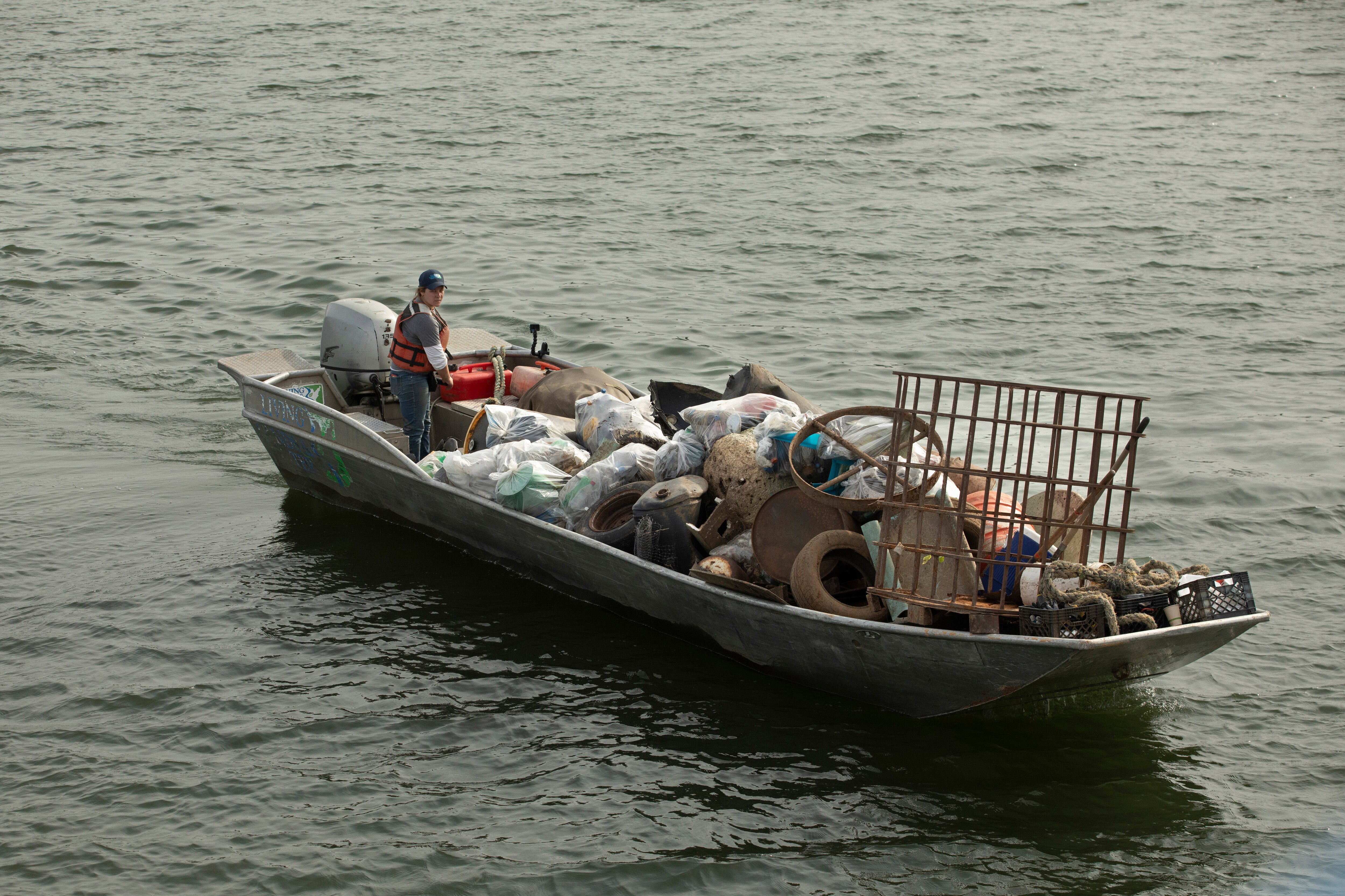 A team of volunteers from Ford and other local organizations partnered with Living Lands and Waters to help with a cleanup of the Ohio River in Louisville, Kentucky, in October 2024.