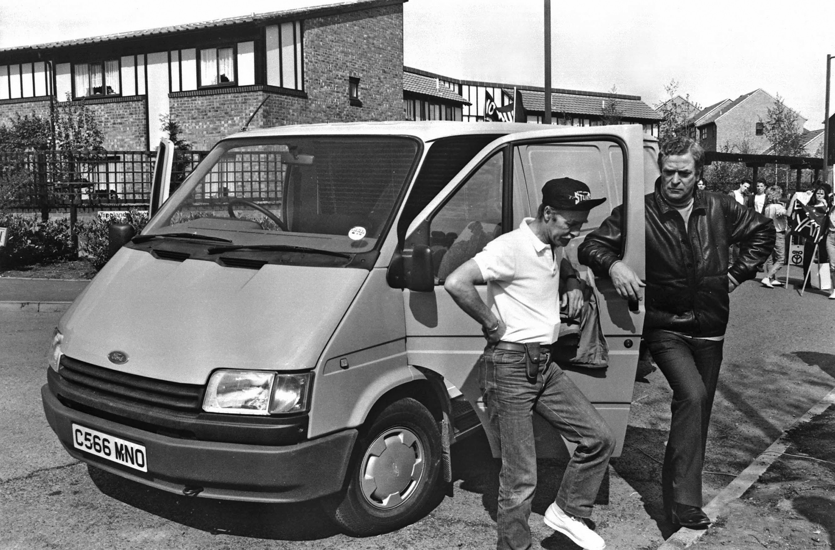 Actor Michael Caine with a Ford Transit on the set for his 1987 movie "The Fourth Protocol."