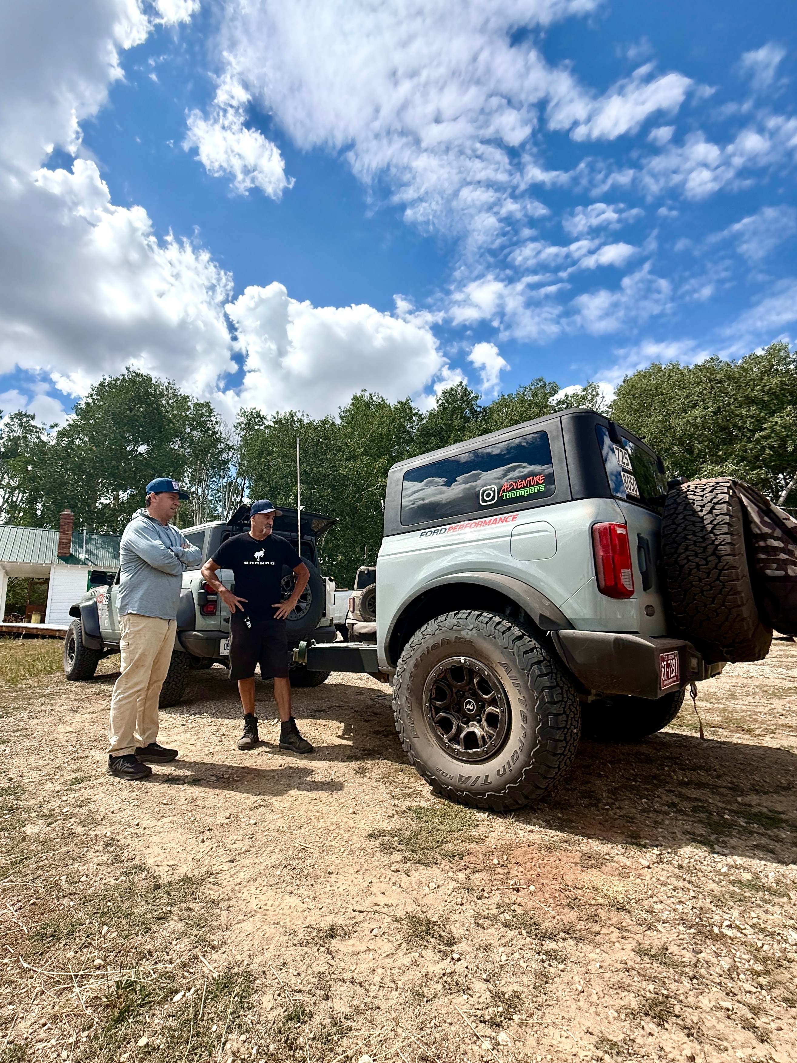 Darin Spreadbury shows Jim Farley the Bronco support trailer he built.