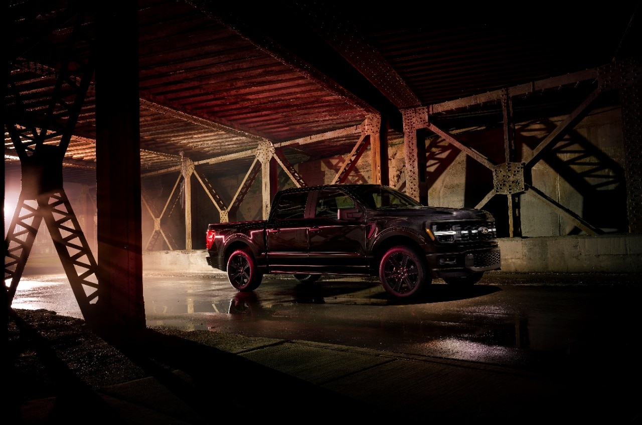Night shot of black 2025 Ford F150 Lobo
