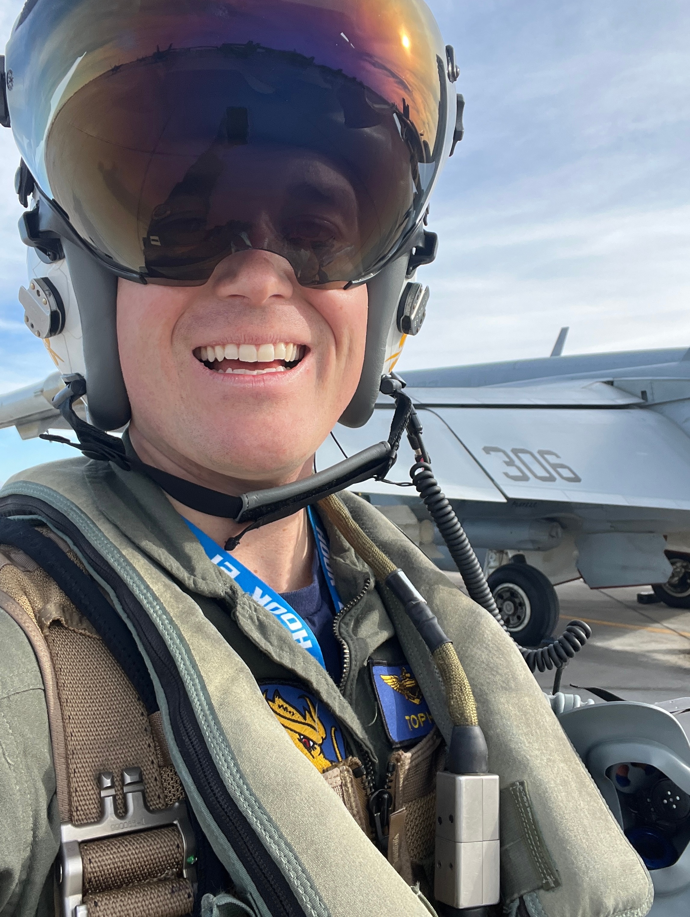 A man in aviation gear takes a selfie