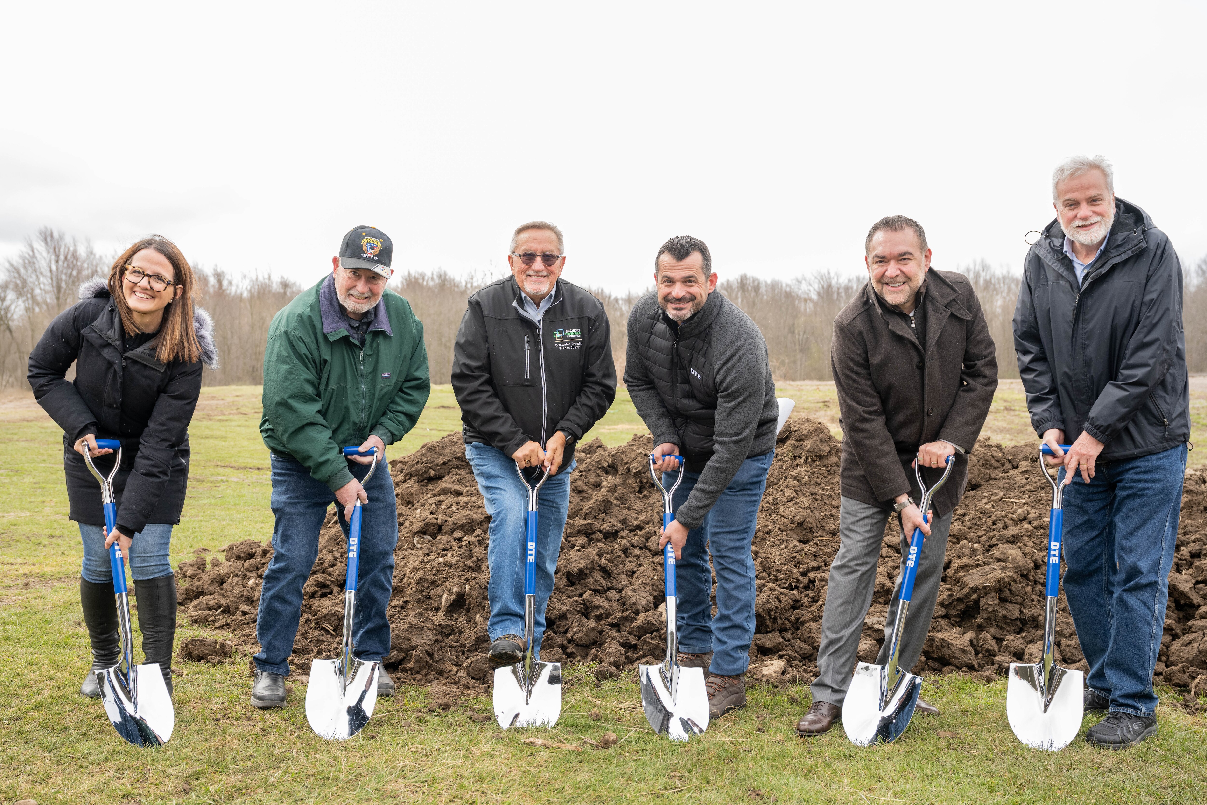 DTE Energy and Ford Motor Company broke ground on April 15 on a new 100-megawatt solar park in Coldwater, Michigan. Pictured (left to right):  Cassie Mayrand-Burney, Global Director, Environmental Quality Office, Ford Motor Co.; Rod Olney, Supervisor of Butler Township; Don Rogers, Supervisor of Coldwater Township; Joe Musallam, Vice President of Renewable Energy, DTE; Amir Mirshahi, Director, Utilities & Sustainable Energy Infrastructure, Ford Land; Randall Hazenbaker, Chairman of the Branch County Commissioners.
