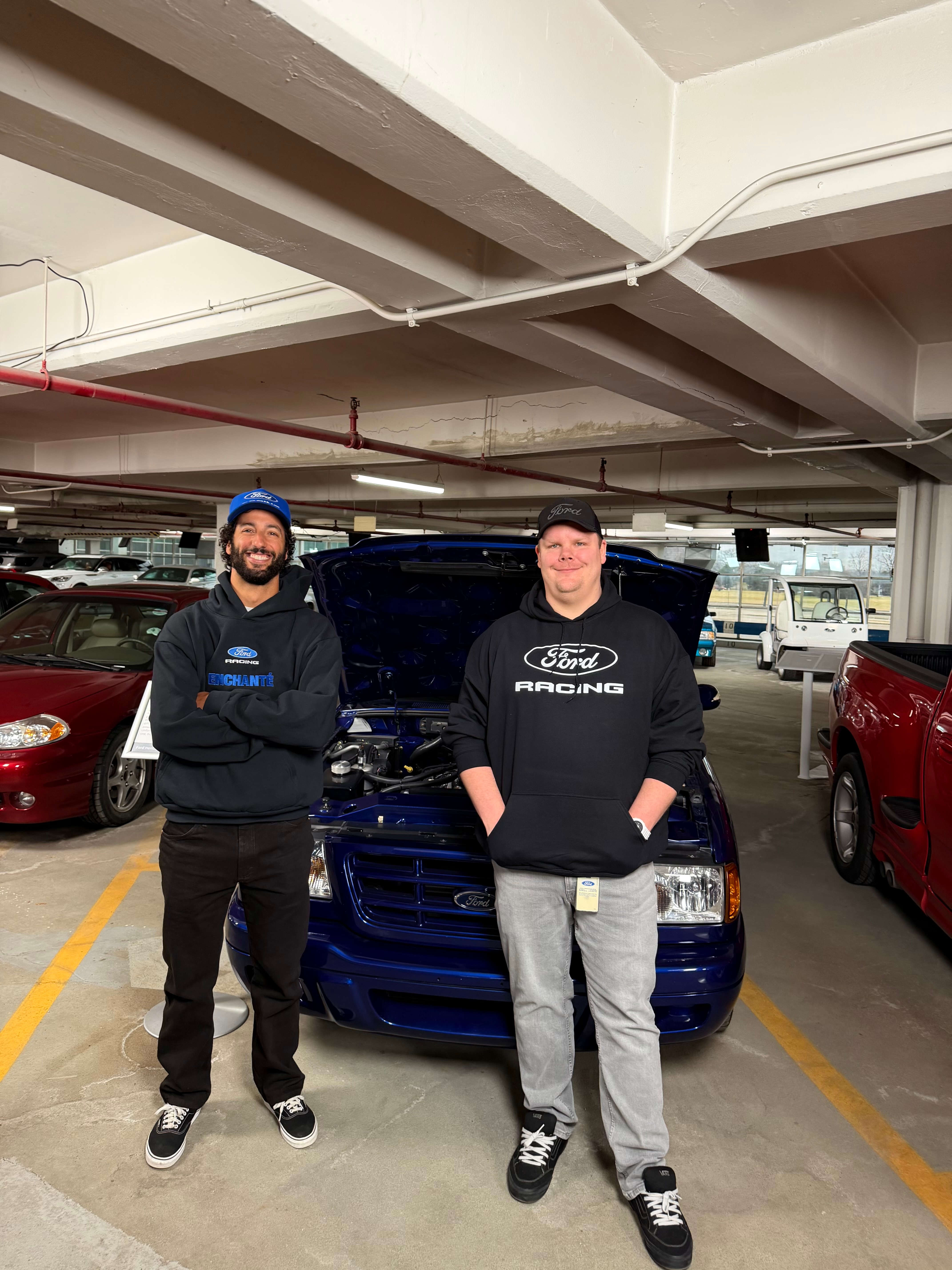 Global Ford Racing Ambassador Daniel Ricciardo poses in front of the SVT Lightning Bolt with Ford Heritage Fleet Manager Matt Korczyk.