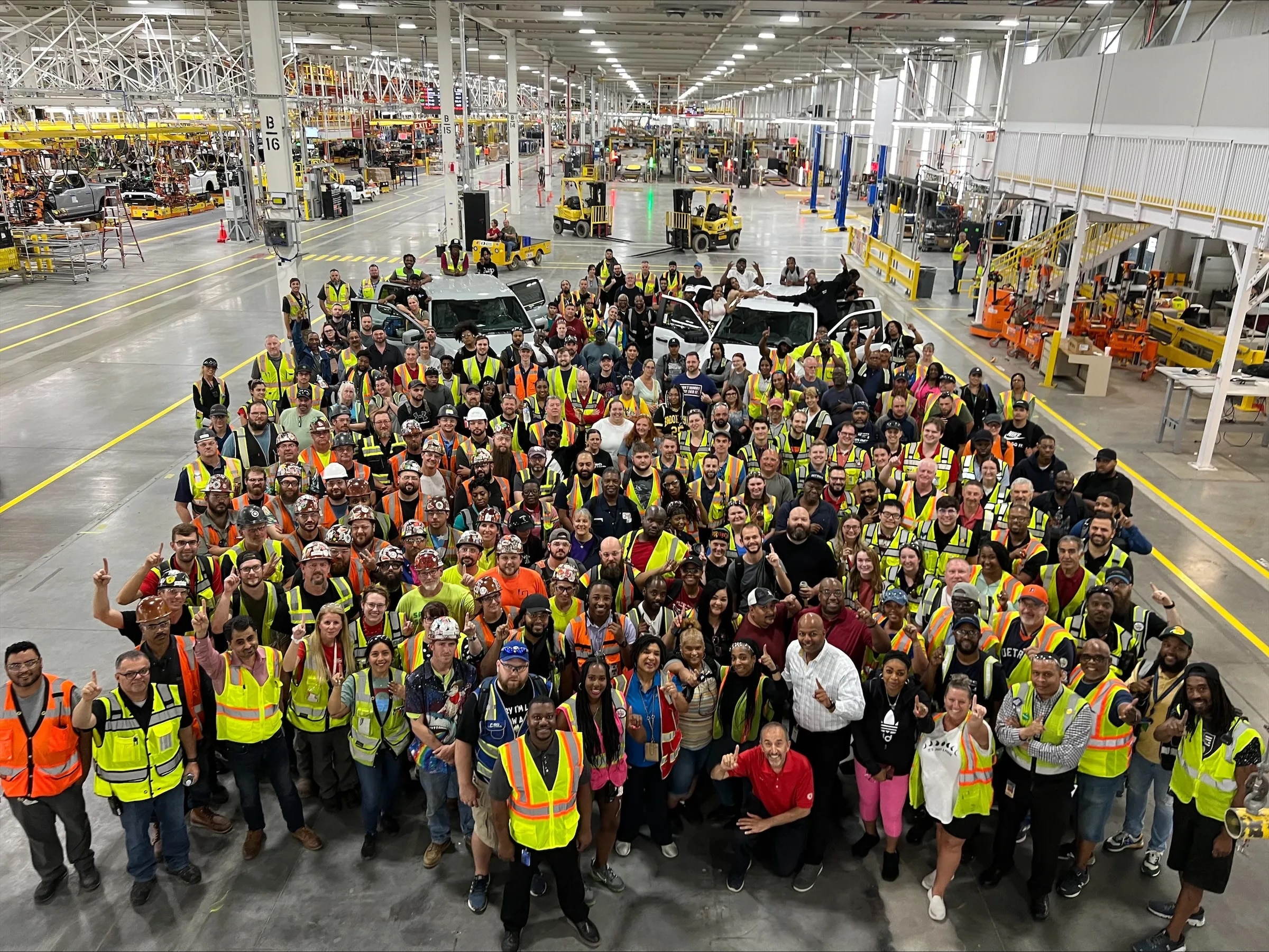 Ford manufacturing workers posing for a group photo