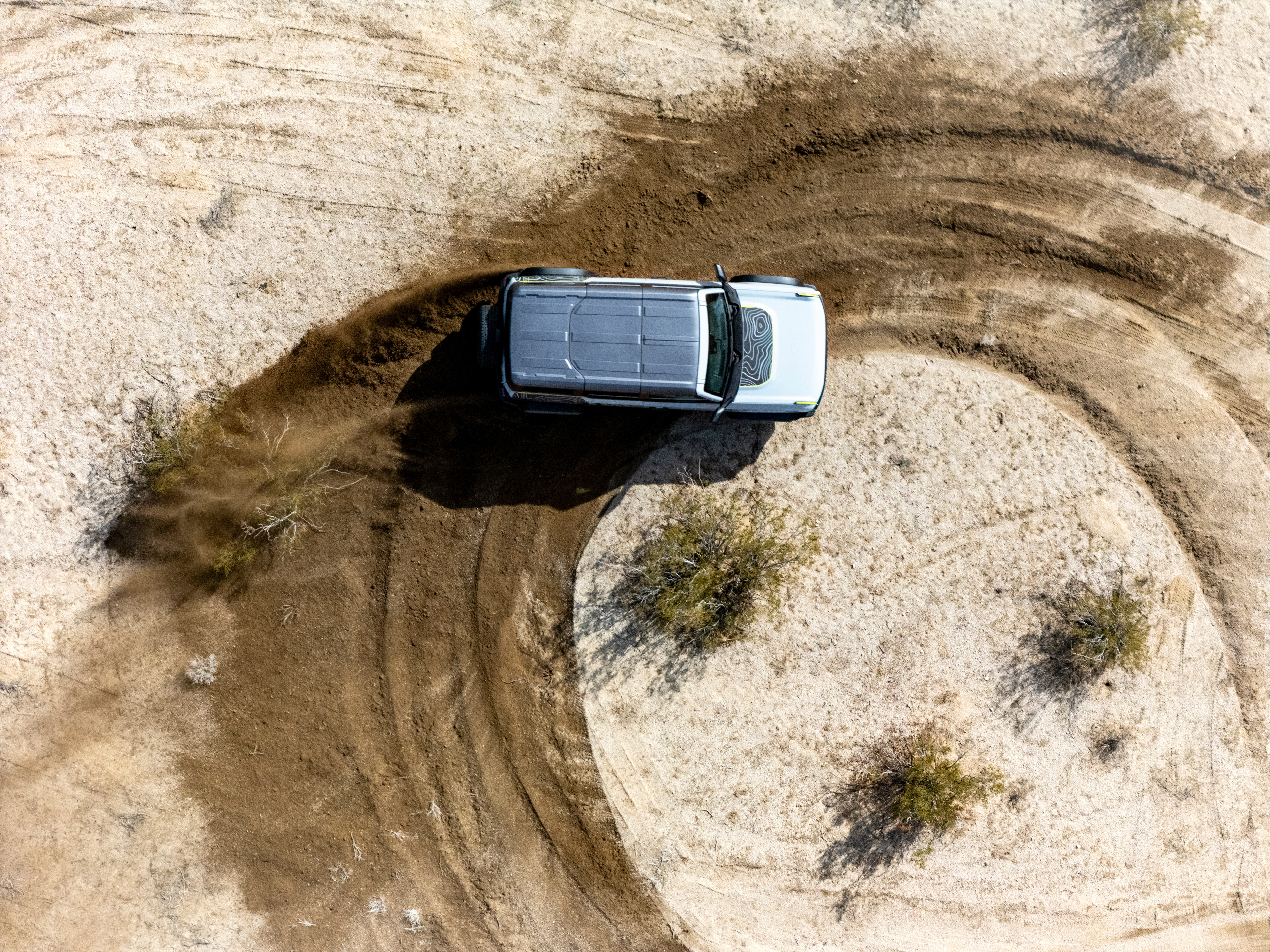 An aerial view of the Bronco RTR doing circles in the dirt.