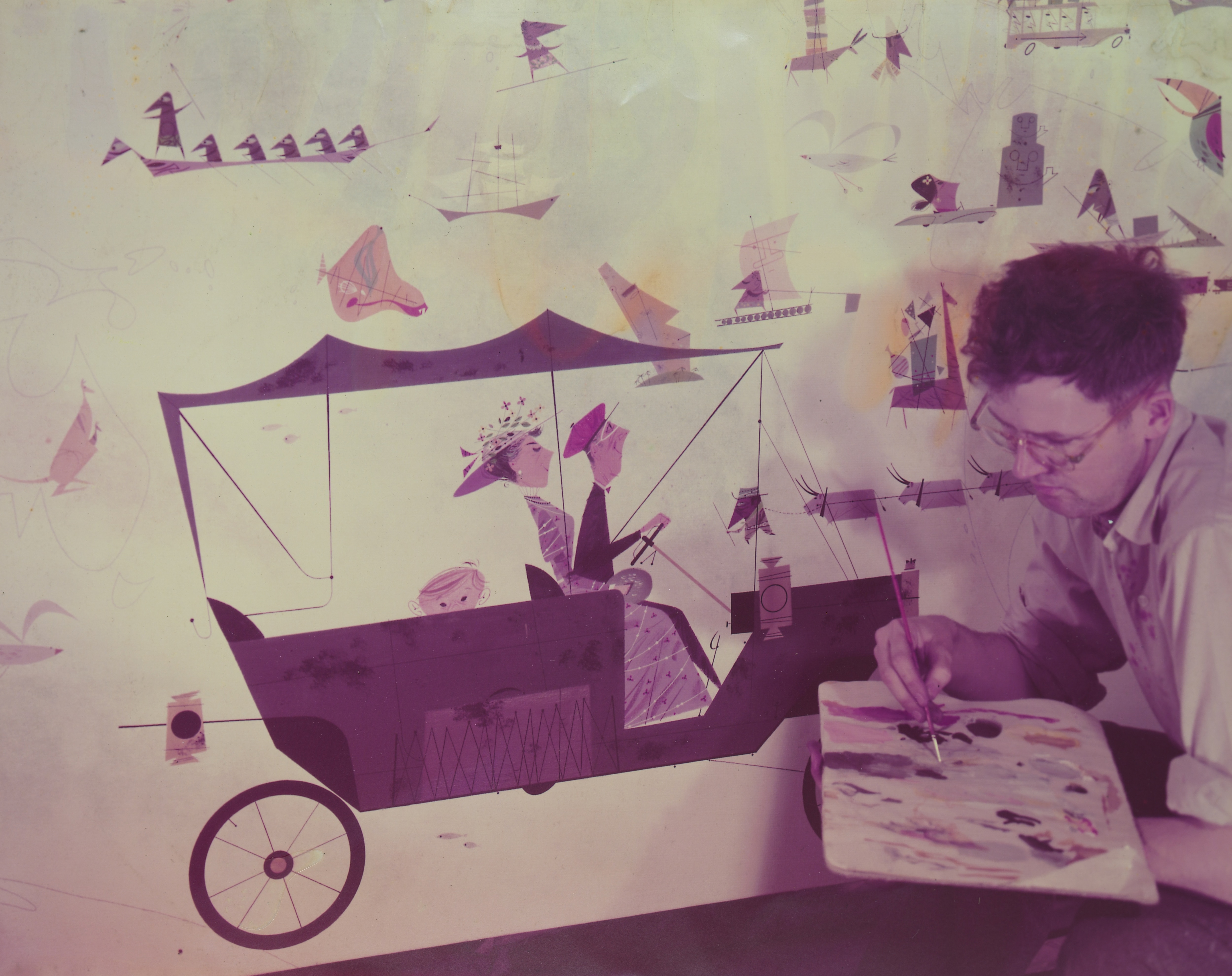 Charley Harper paints the “Transportation Around the World” mural at the Ford Rotunda building. Credit: Edie Harper.