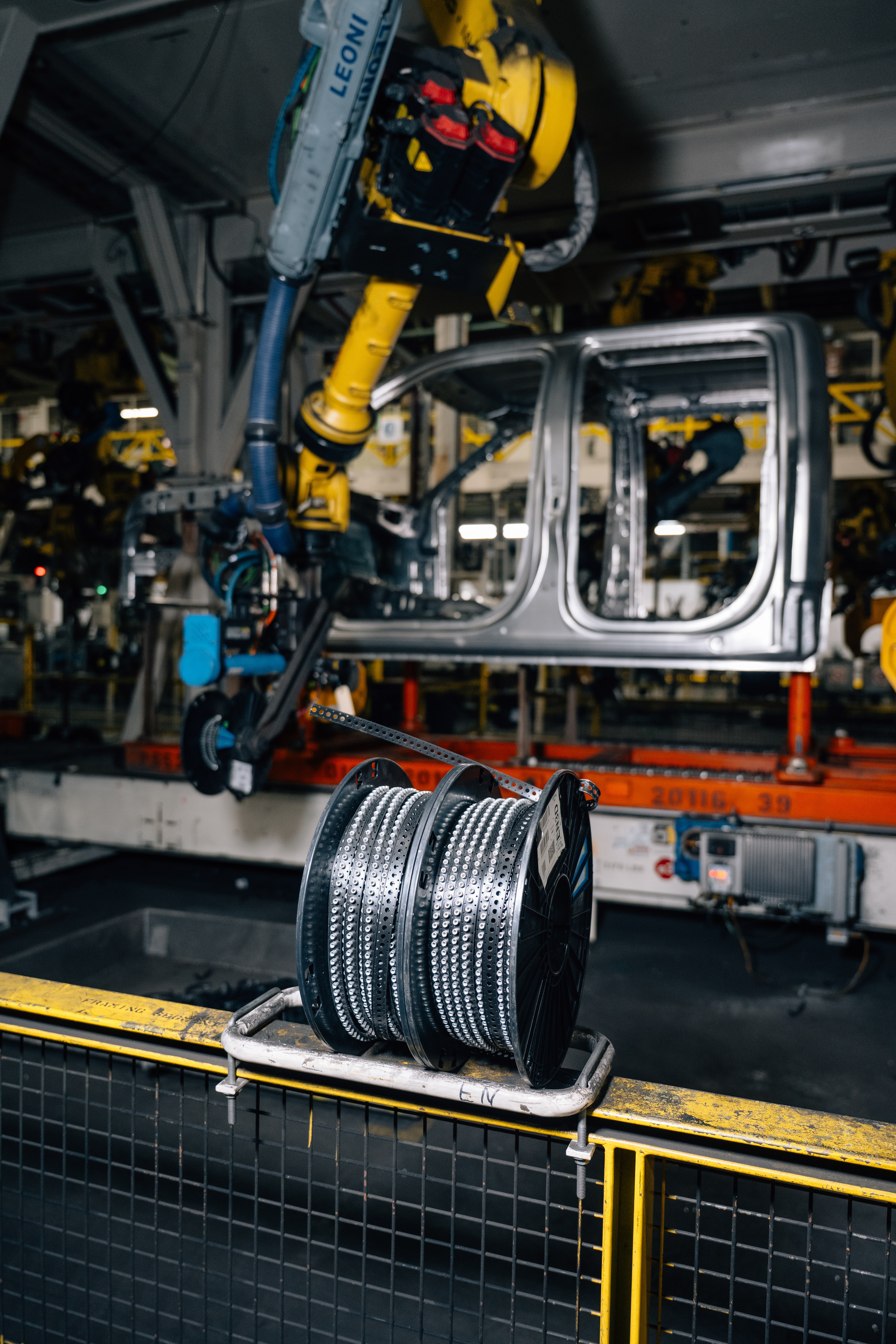 At Dearborn Truck Plant, rivet strips keep fasteners aligned and ready for installation. The spent strips are then recycled and turned into battery trays.