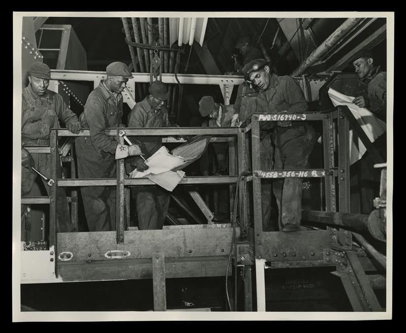 ford workers wearing carhartt uniforms