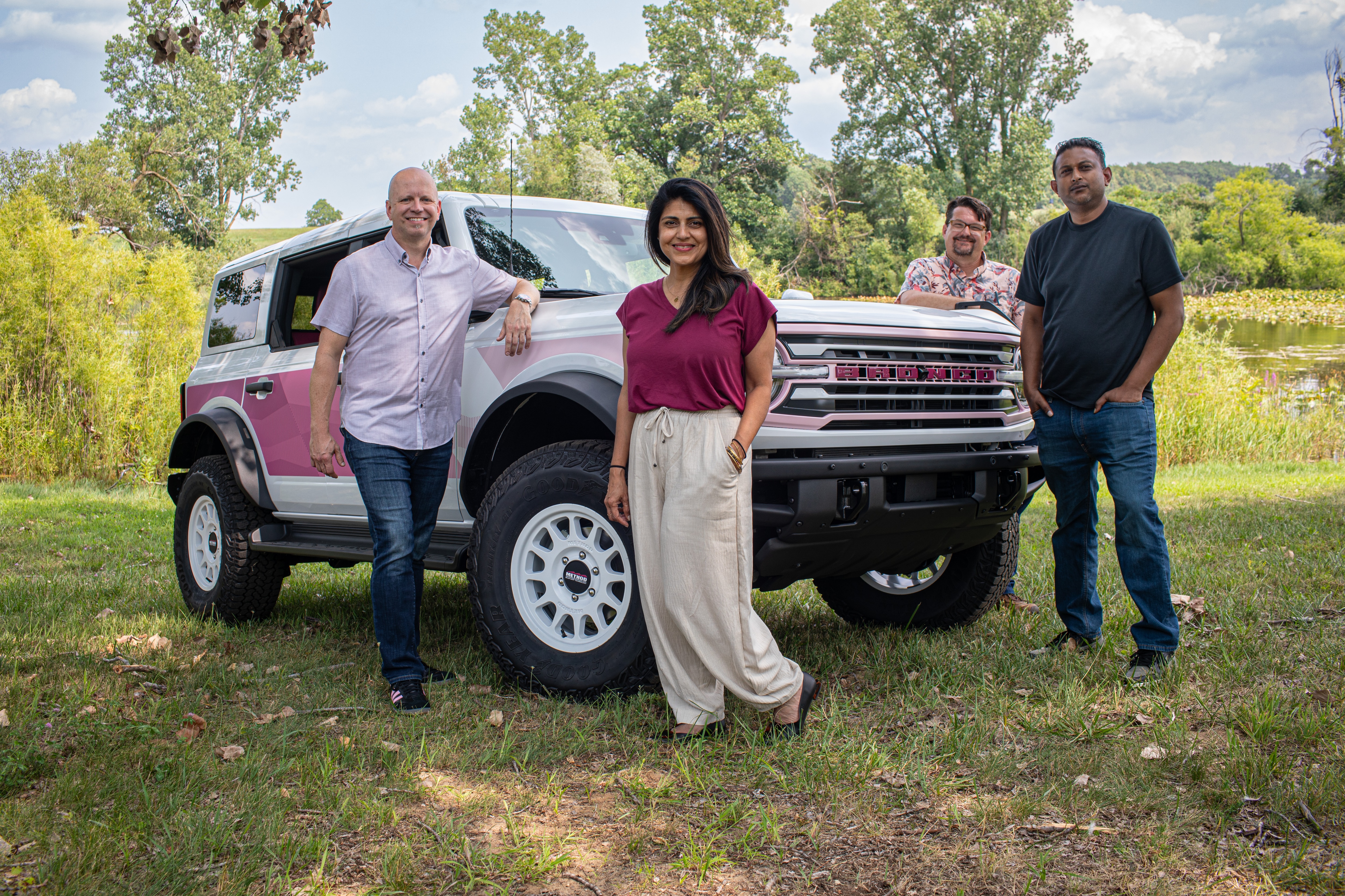 Steve Gilmore, Bhavna Mistry, Nahshon Francis (in black), and Ryan Christiansen with the Ford Bronco Desert Rising Edition.