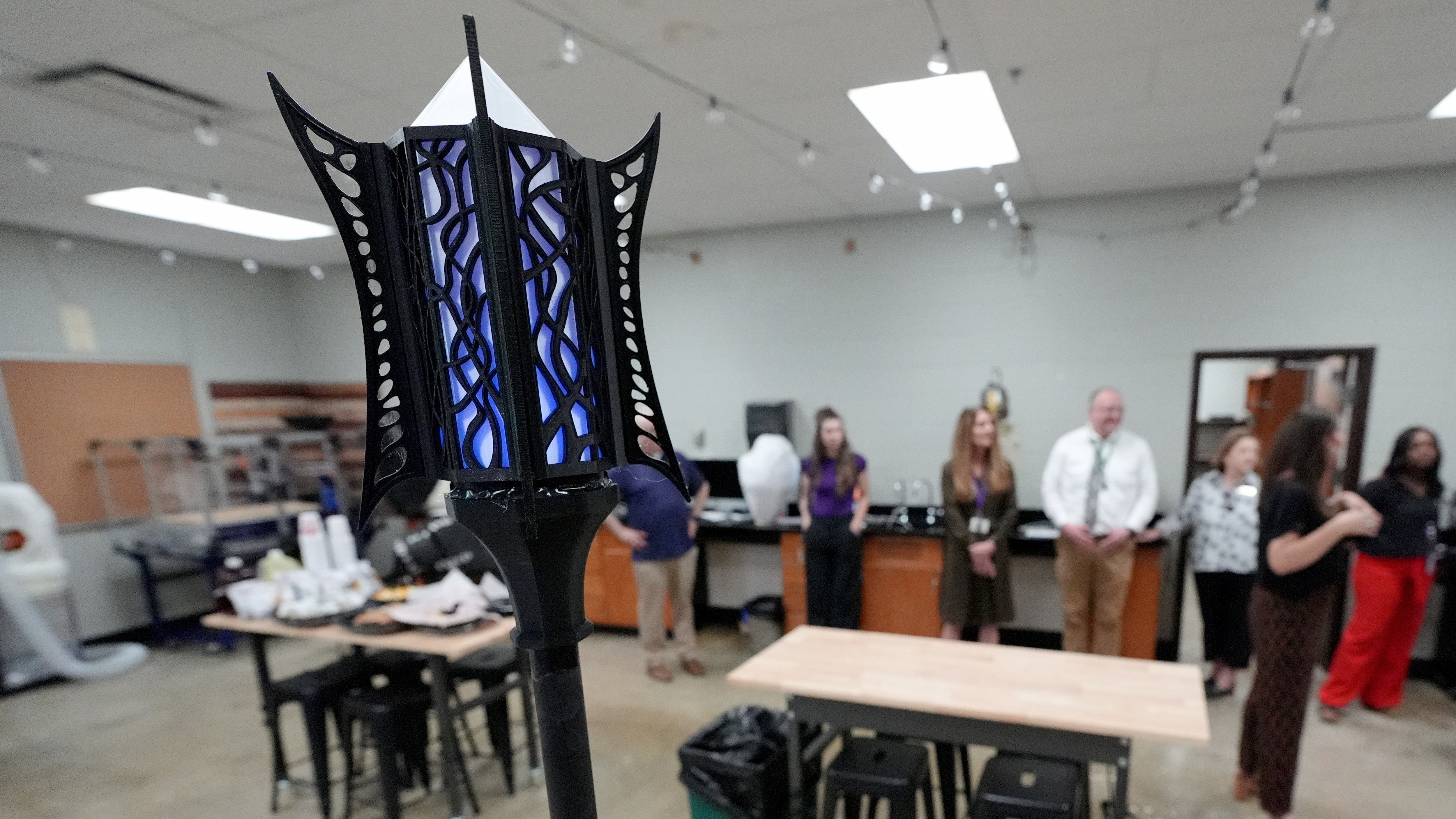 Visiting teachers learn how Haywood High School’s Career and Technical Education (CTE) students used the 3D printers in the school’s Ford Future Builders Lab to produce the intricate designs of theater props, including lanterns, April 14, 2026. The lab is one of several that opened this academic year in West Tennessee to assist K-12 students and their teachers to learn about tools of skilled trades, including laser cutting, 3D printing and coding. (Rogelio V. Solis for Ford Communications)