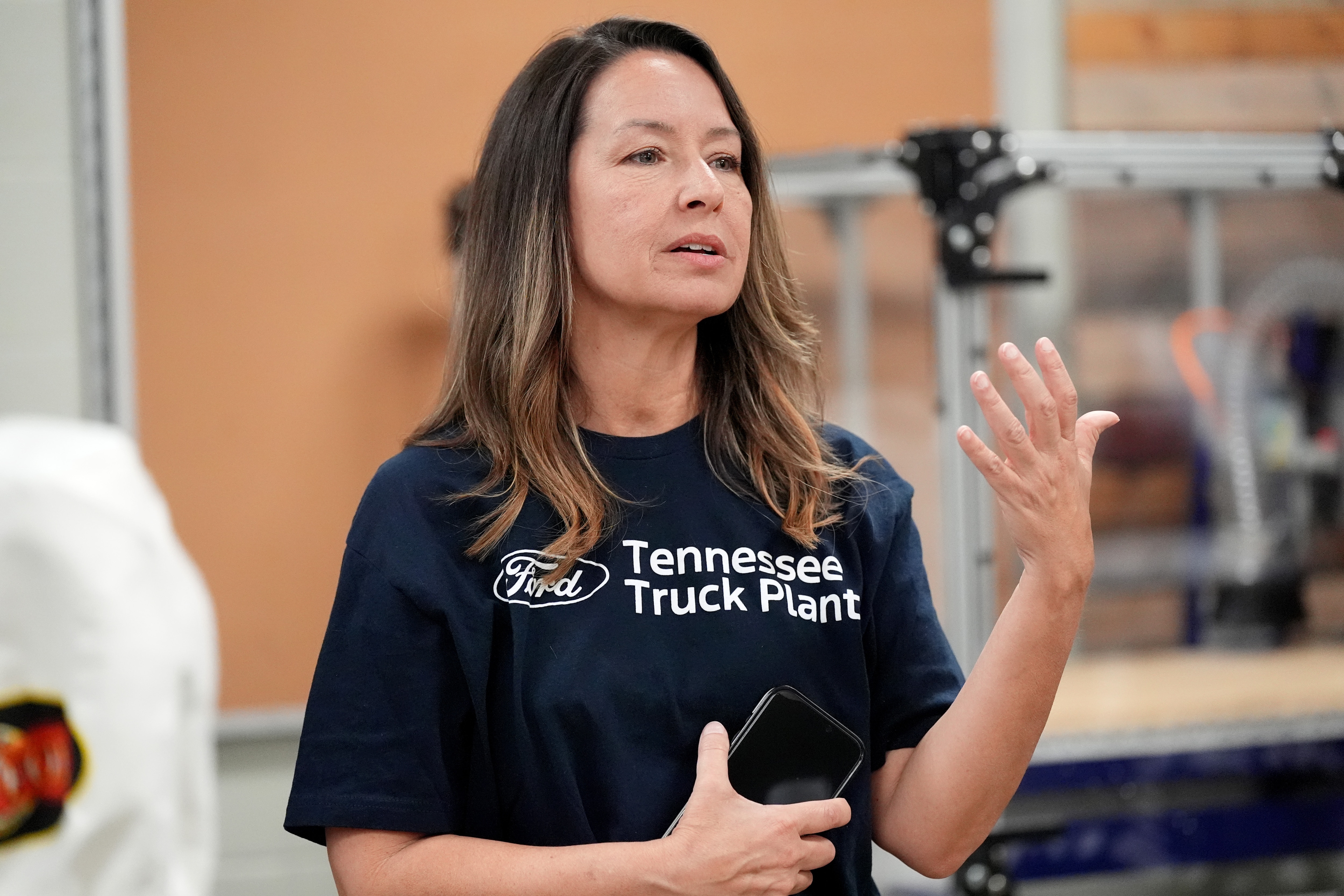 Marianne Dunavant, a Ford Community Relations Manager, left, speaks to area educators about the Ford Future Builders Lab during a tour of the Brownsville, Tenn., lab at Haywood High School, April 14, 2026. The lab is one of several that opened this academic year in West Tennessee to assist K-12 students and their teachers to learn about tools of skilled trades, including laser cutting, 3D printing and coding. (Rogelio V. Solis for Ford Communications)