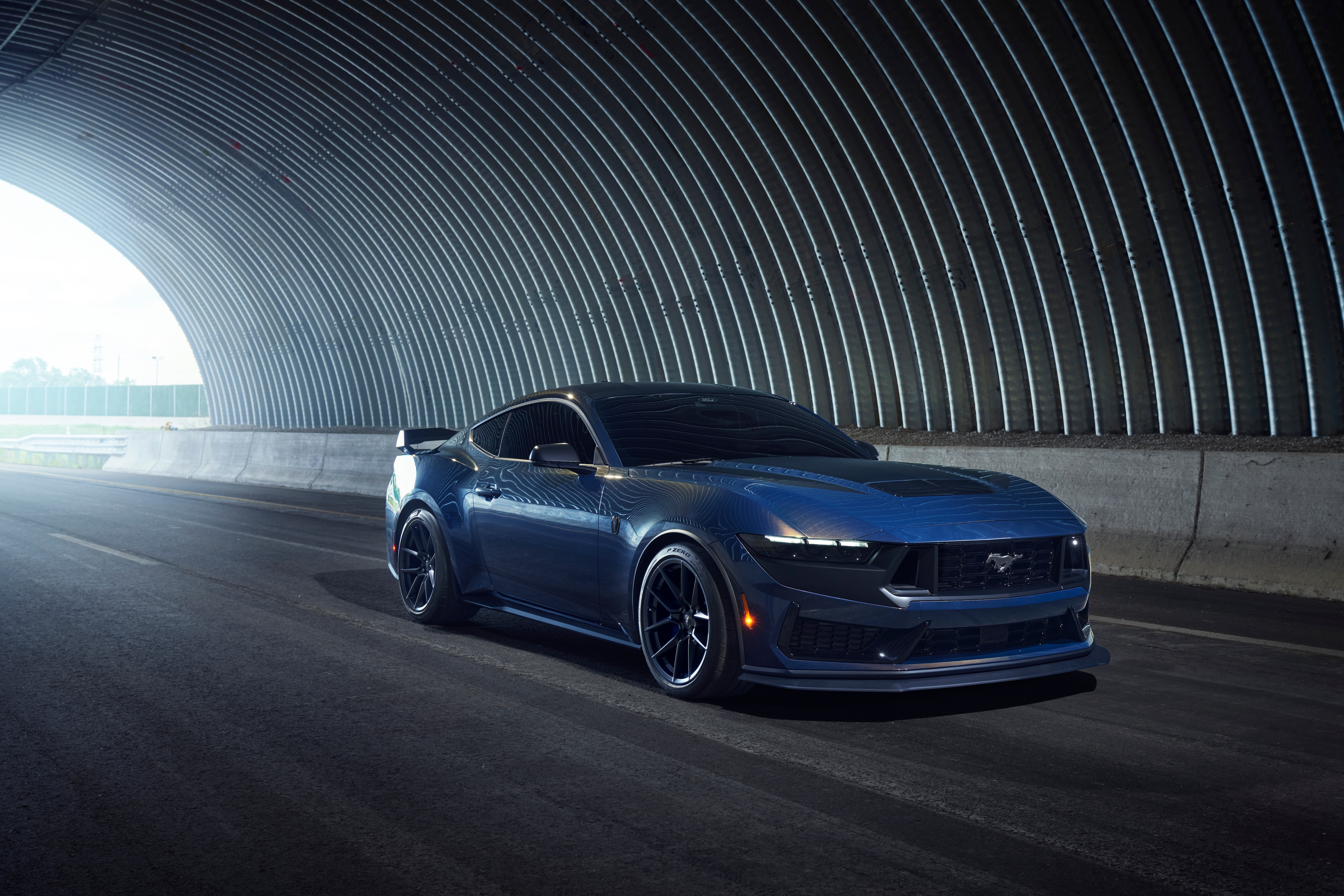 The 2026 Mustang Dark Horse has 810 hp and 615 lb.-ft. of torque when equipped with active valve exhaust (800 hp for standard exhaust).
