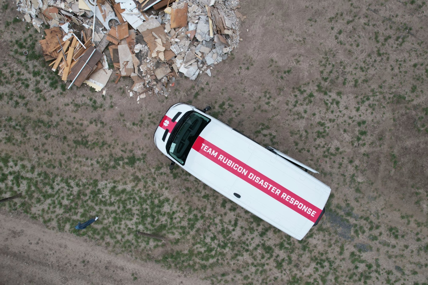 Deployed to flood-ravaged Texas Hill Country, a custom Ford Transit van designed with GRIDRACK helps Team Rubicon disaster responders save critical time.