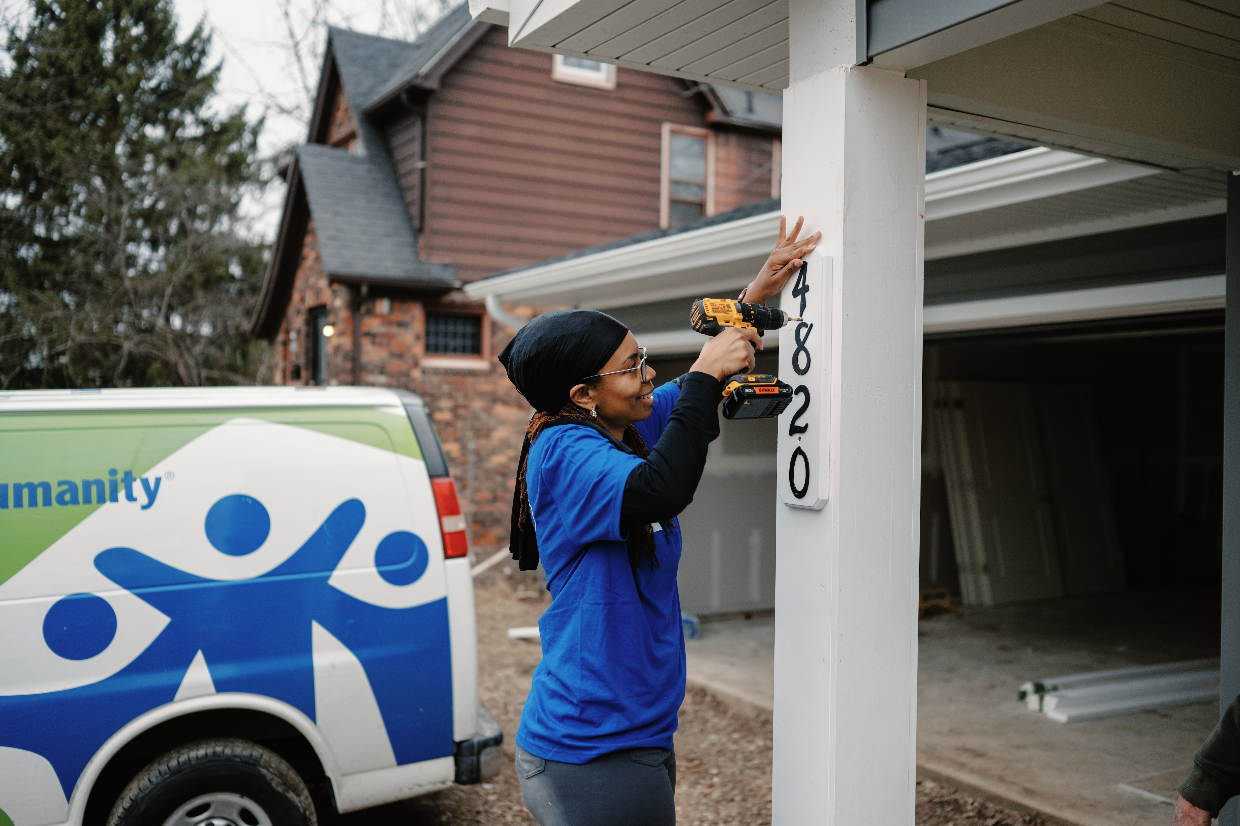 Ford Volunteer Corps members returned again and again over the next year — raising those walls, hanging drywall, installing doors, painting rooms, and planting gardens.