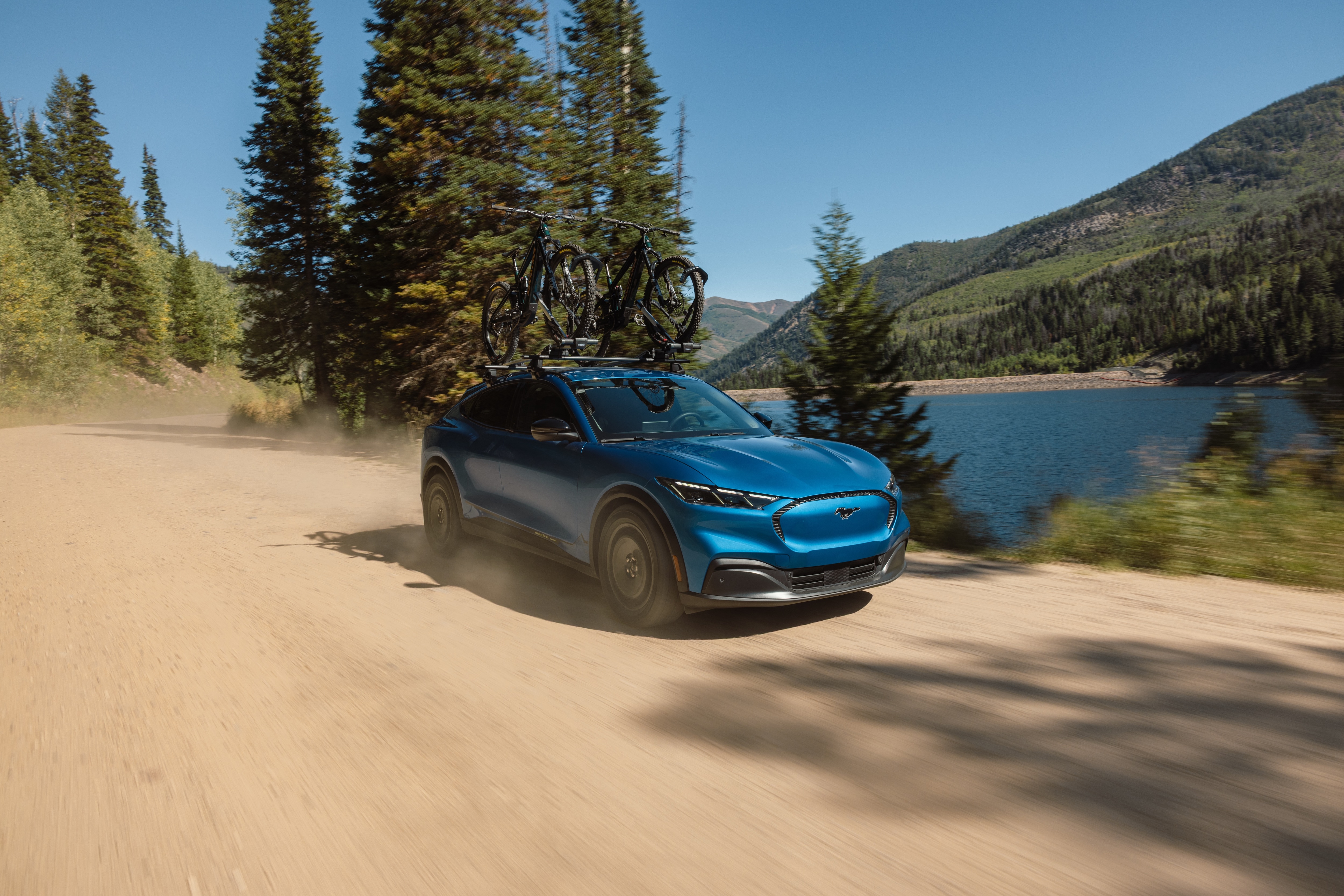 The new 2027 Mustang Mach-E Trail combines the everyday electric performance and usability customers expect and love with purpose-designed hardware for the road to the trailhead, campsite, or water.