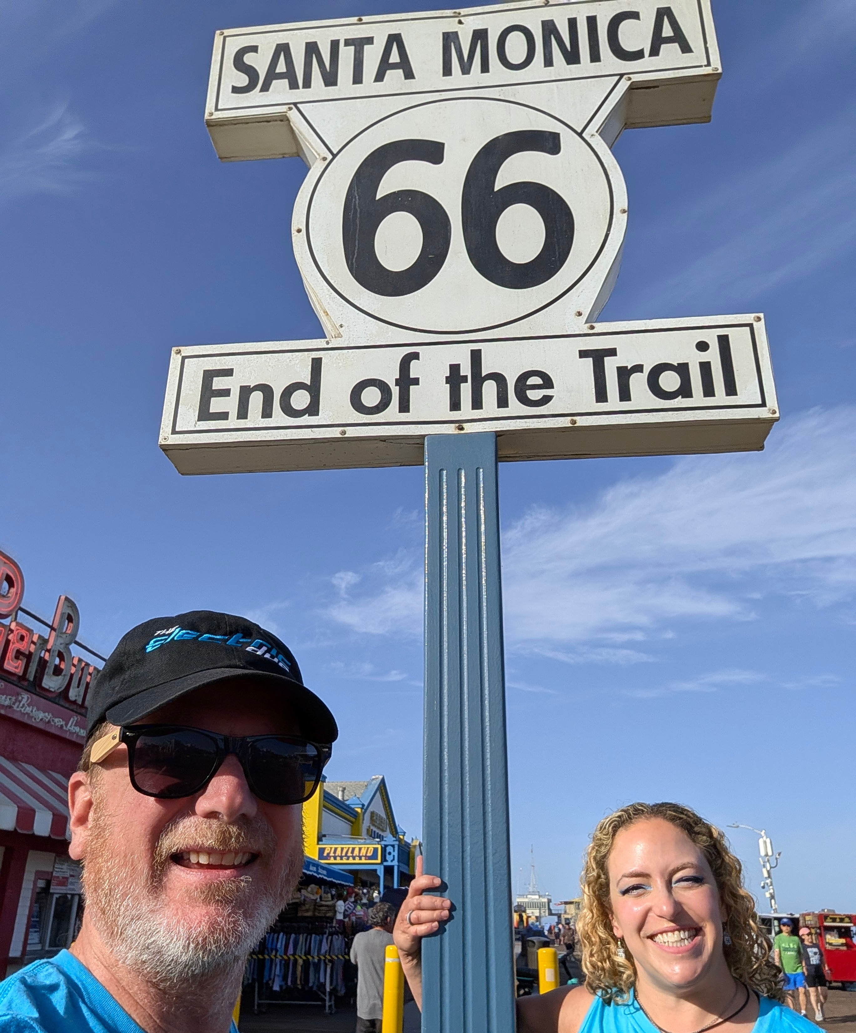 The Electric Duo celebrates their completed journey at Santa Monica Pier.  