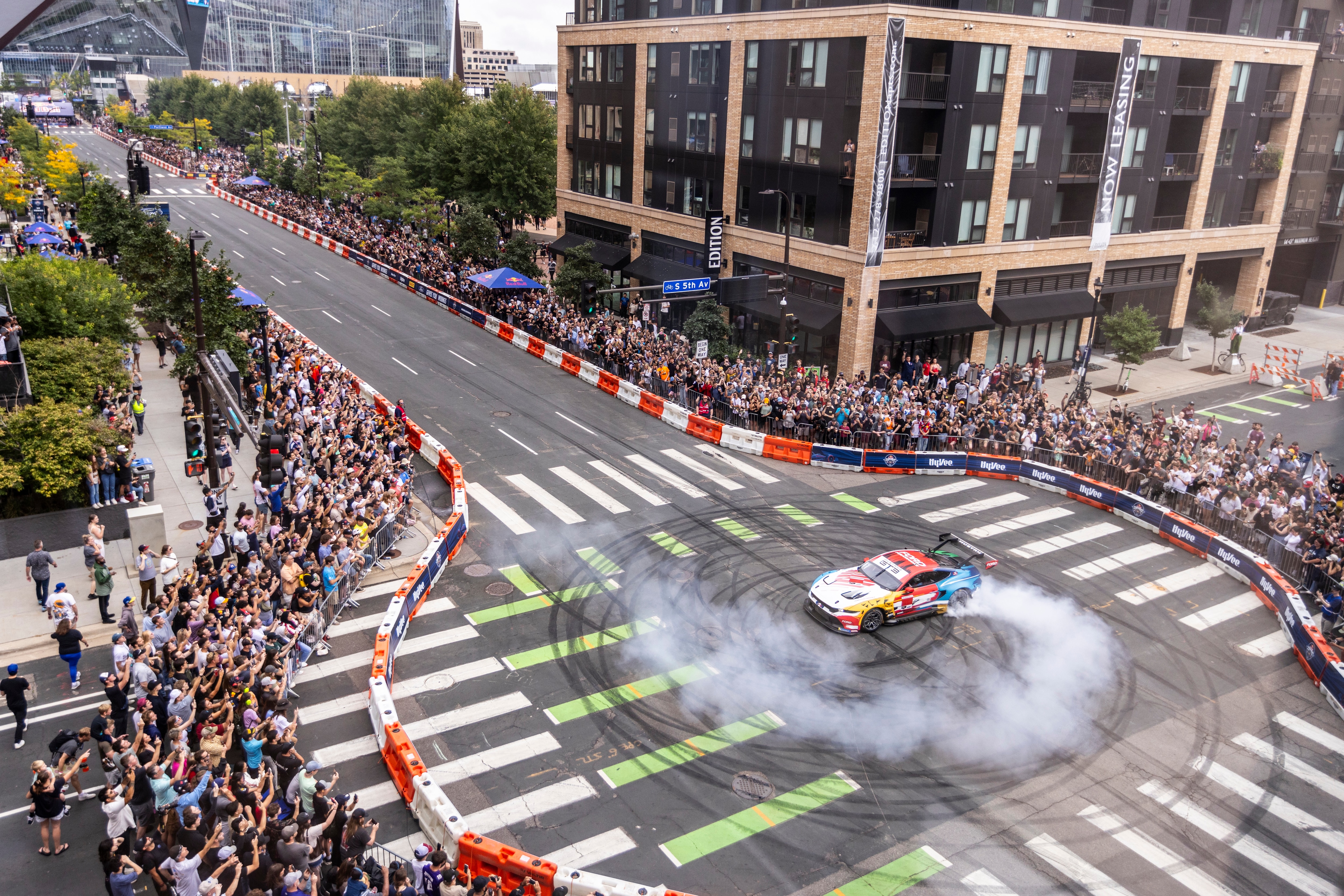 A Ford Red Bull Mustang GT3 circles a track in Minneapolis. 