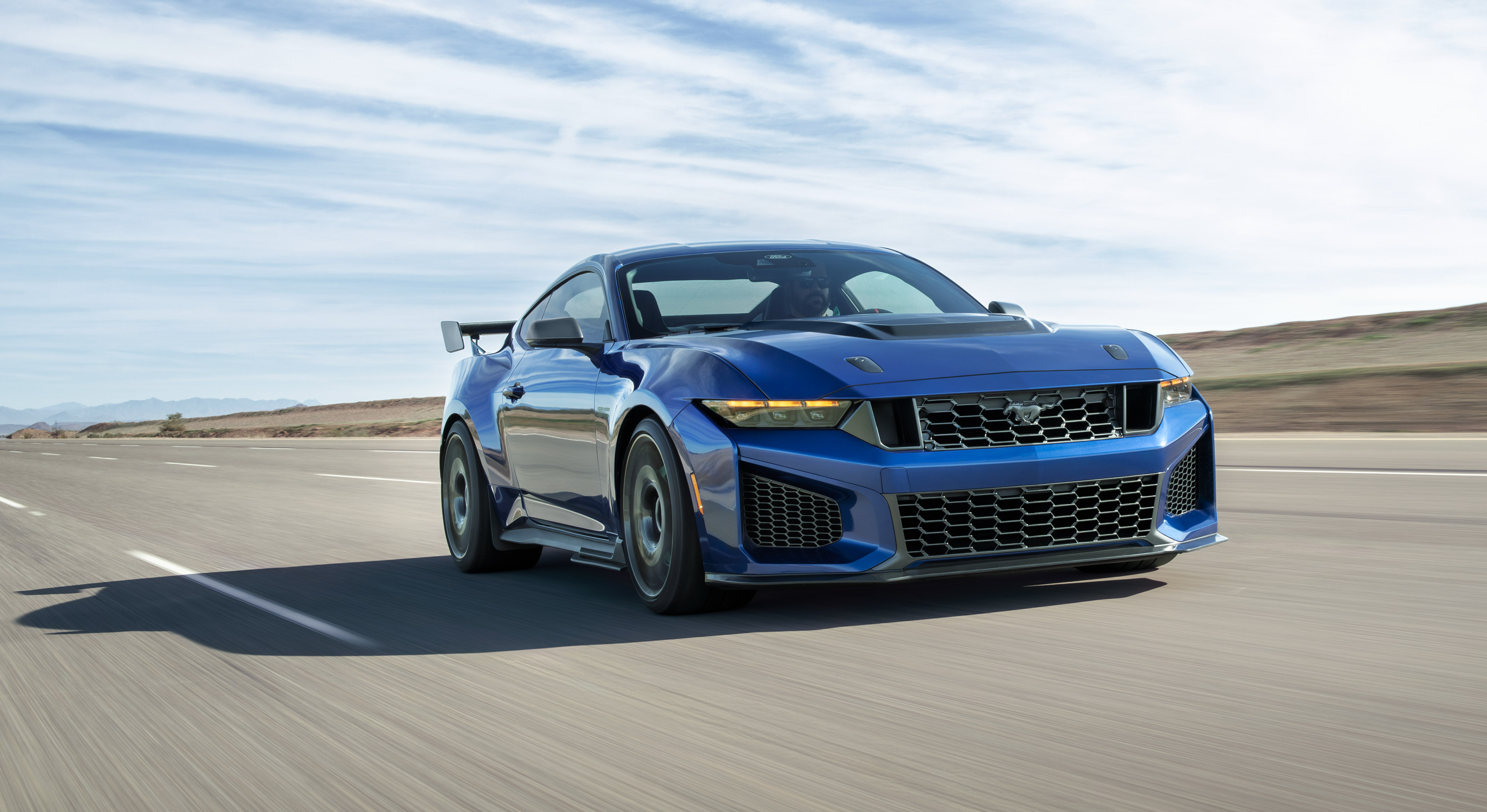 By working with the GTD team, we were able to adopt Brembo carbon-ceramic brakes and Michelin Pilot Sport Cup2 R tires for the Mustang Dark Horse SC Track Pack. Prototype vehicle shown. Actual production vehicle may vary. Available summer 2026.