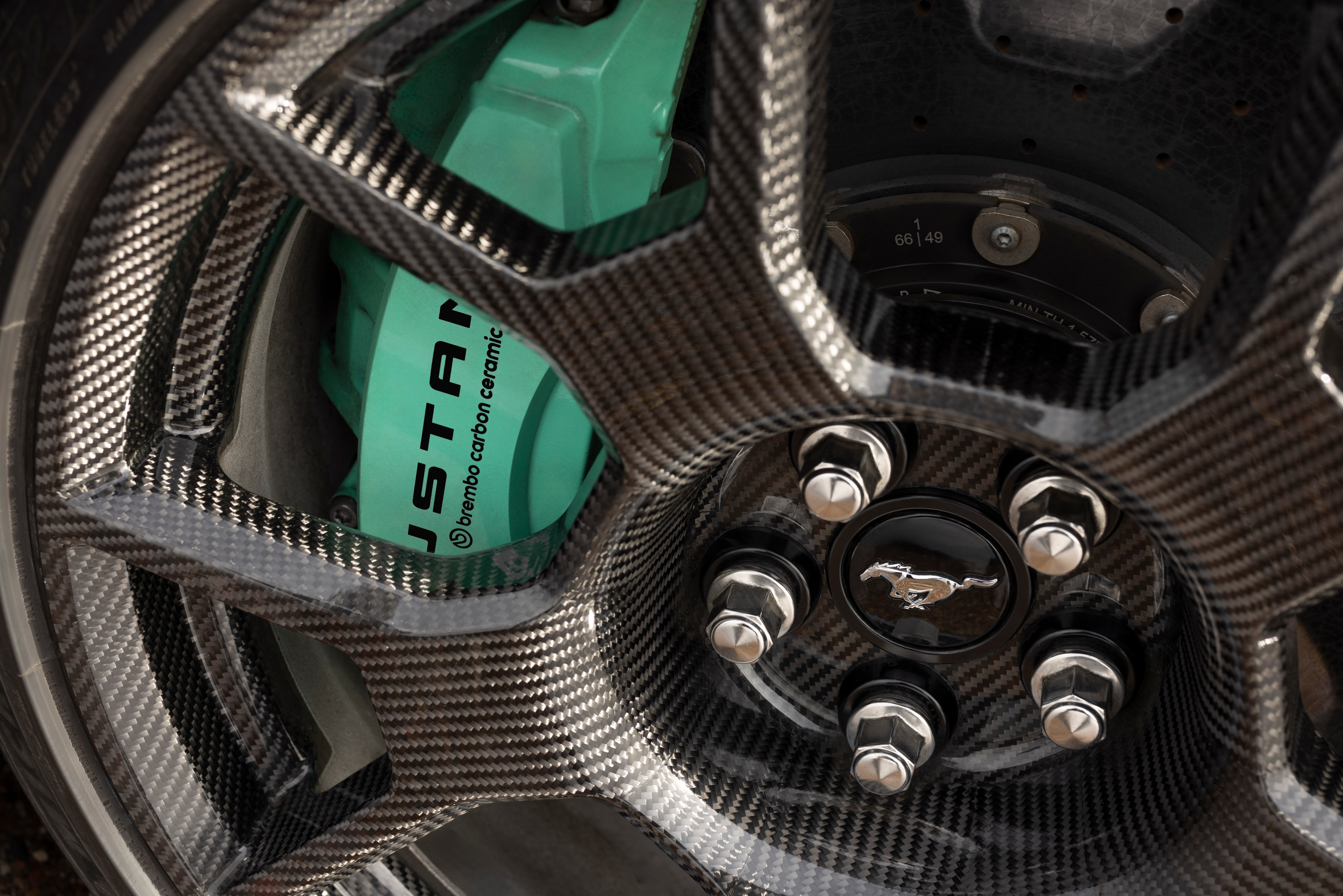 By working with the GTD team, we were able to adopt Brembo carbon-ceramic brakes and Michelin Pilot Sport Cup2 R tires for the Mustang Dark Horse SC Track Pack. Prototype vehicle shown. Actual production vehicle may vary. Available summer 2026.