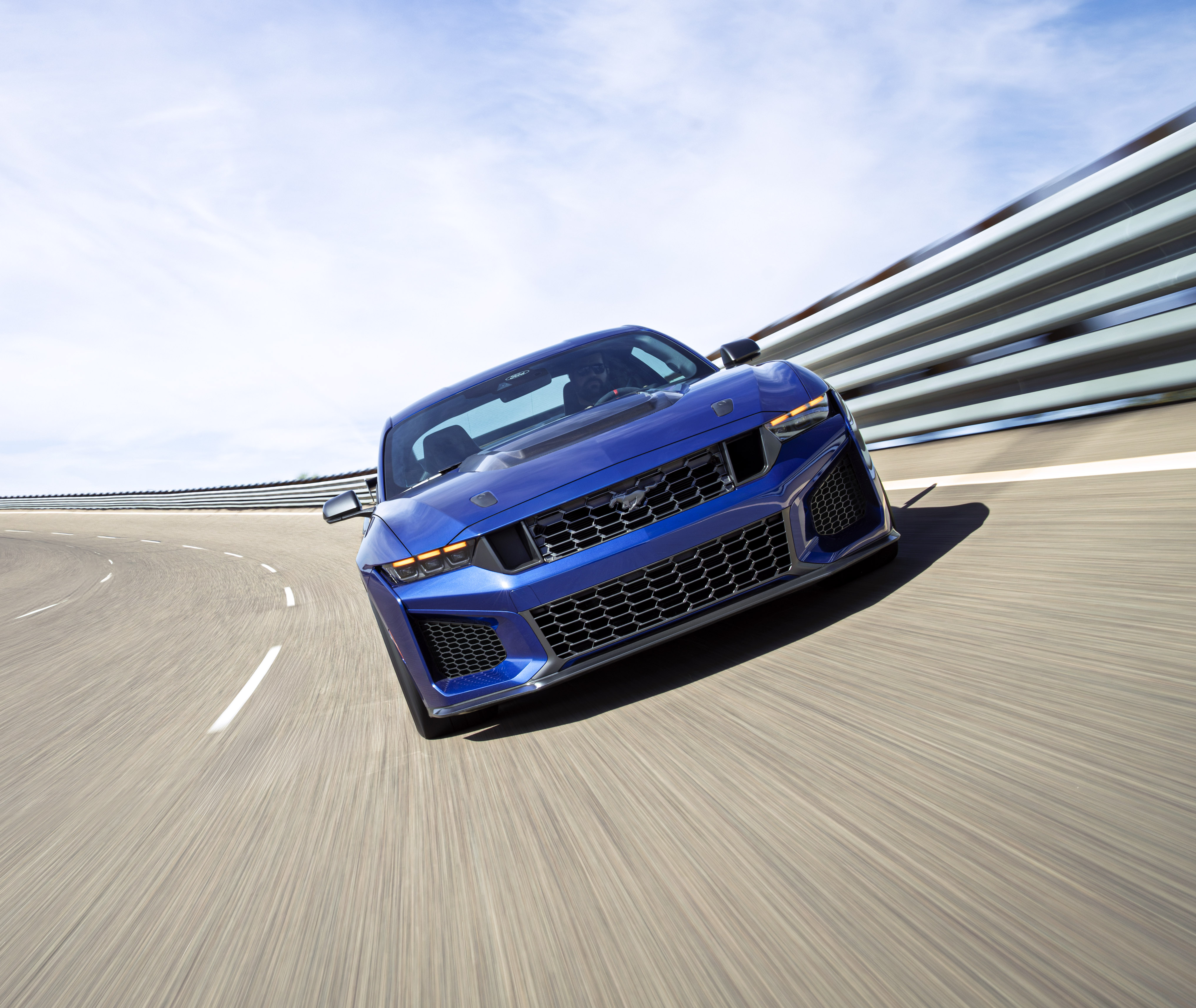 By working with the GTD team, we were able to adopt Brembo carbon-ceramic brakes and Michelin Pilot Sport Cup2 R tires for the Mustang Dark Horse SC Track Pack. Prototype vehicle shown. Actual production vehicle may vary. Available summer 2026.